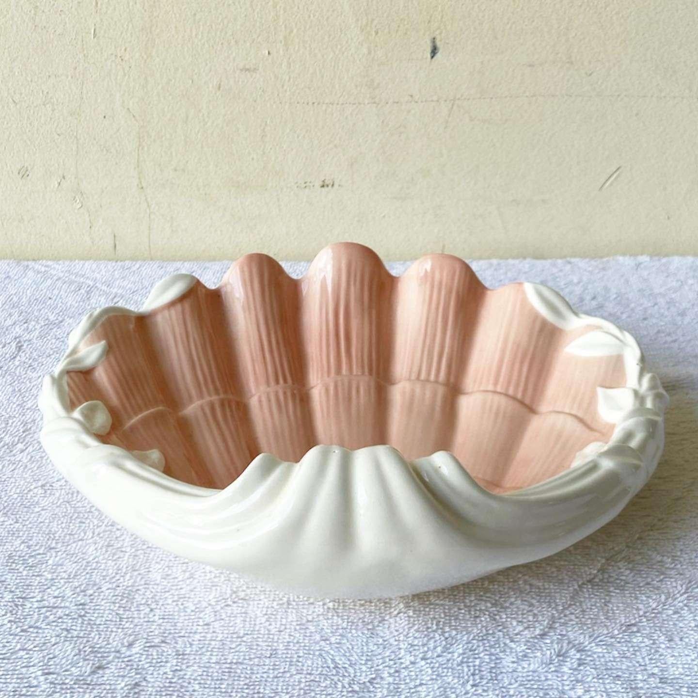 Wonderful vintage ceramic sea shell dish by Fitz and Floyd. Features a glossy cream finish.