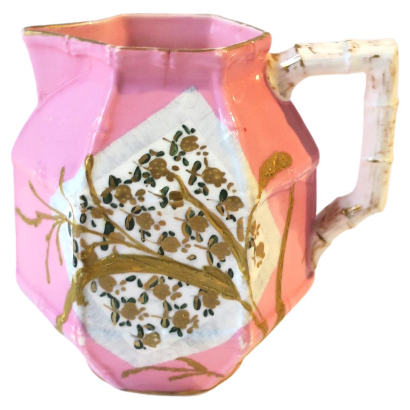 Chinoiserie Style Pink and Gold Ceramic Pitcher with Bamboo Design For Sale