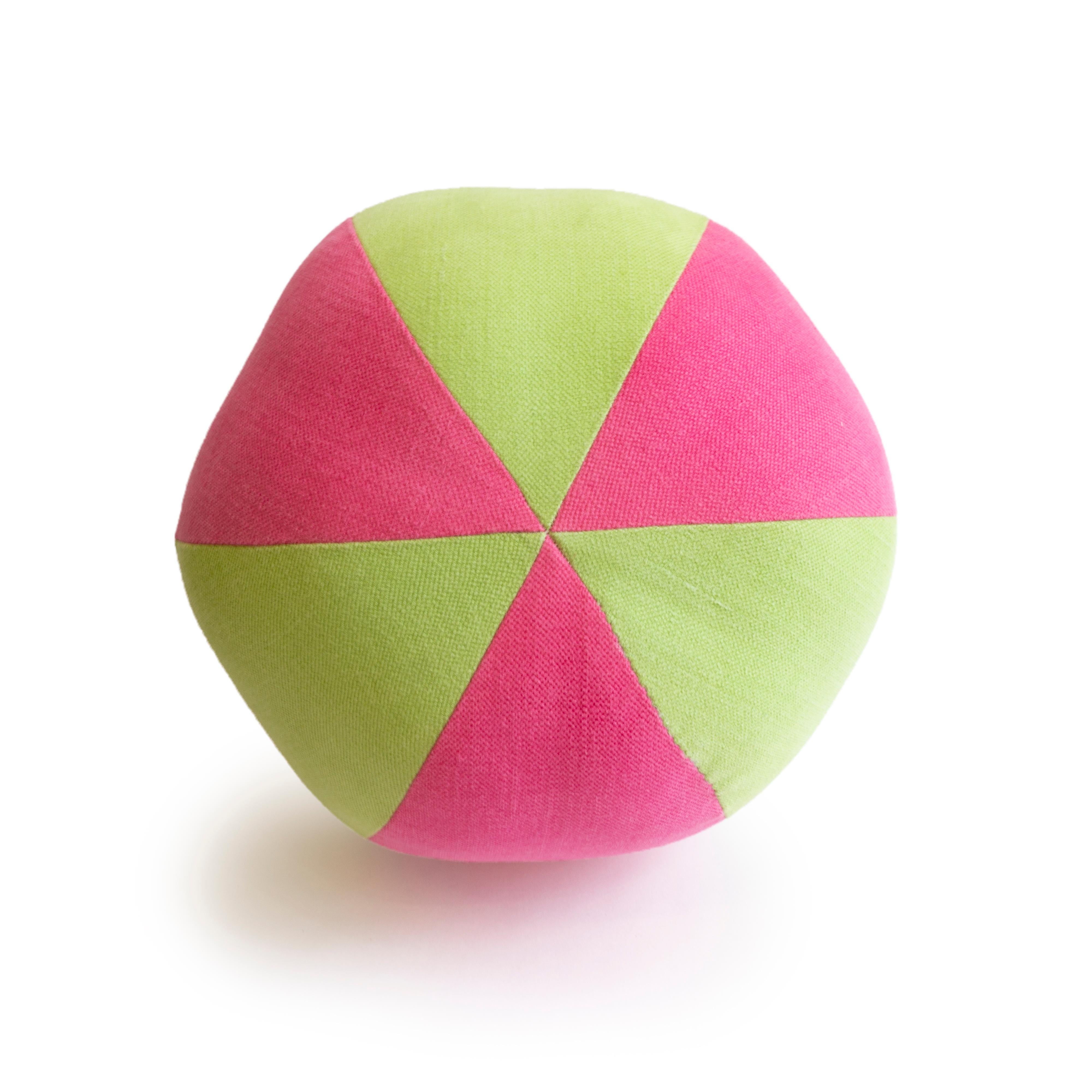 Our handmade round ball throw pillow is sewn in a pink and green fabric resembling a beach ball. All of our pillows are hand sewn at our studio in Norwalk, Connecticut.

Measurements: 9