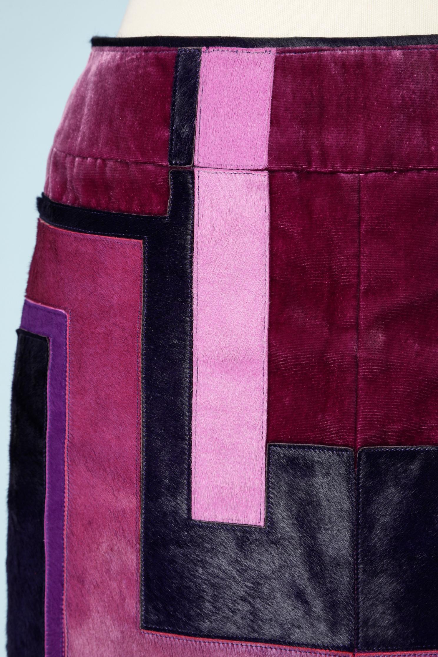 Pink and purple calfskin and velvet patchwork skirt with silk & rayon lining. 
SIZE: 40 ( It) 