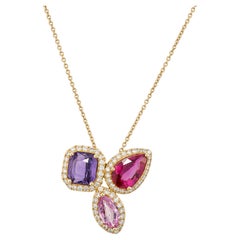 Collana a grappolo con zaffiri rosa e viola e diamanti in oro giallo 18 ct.