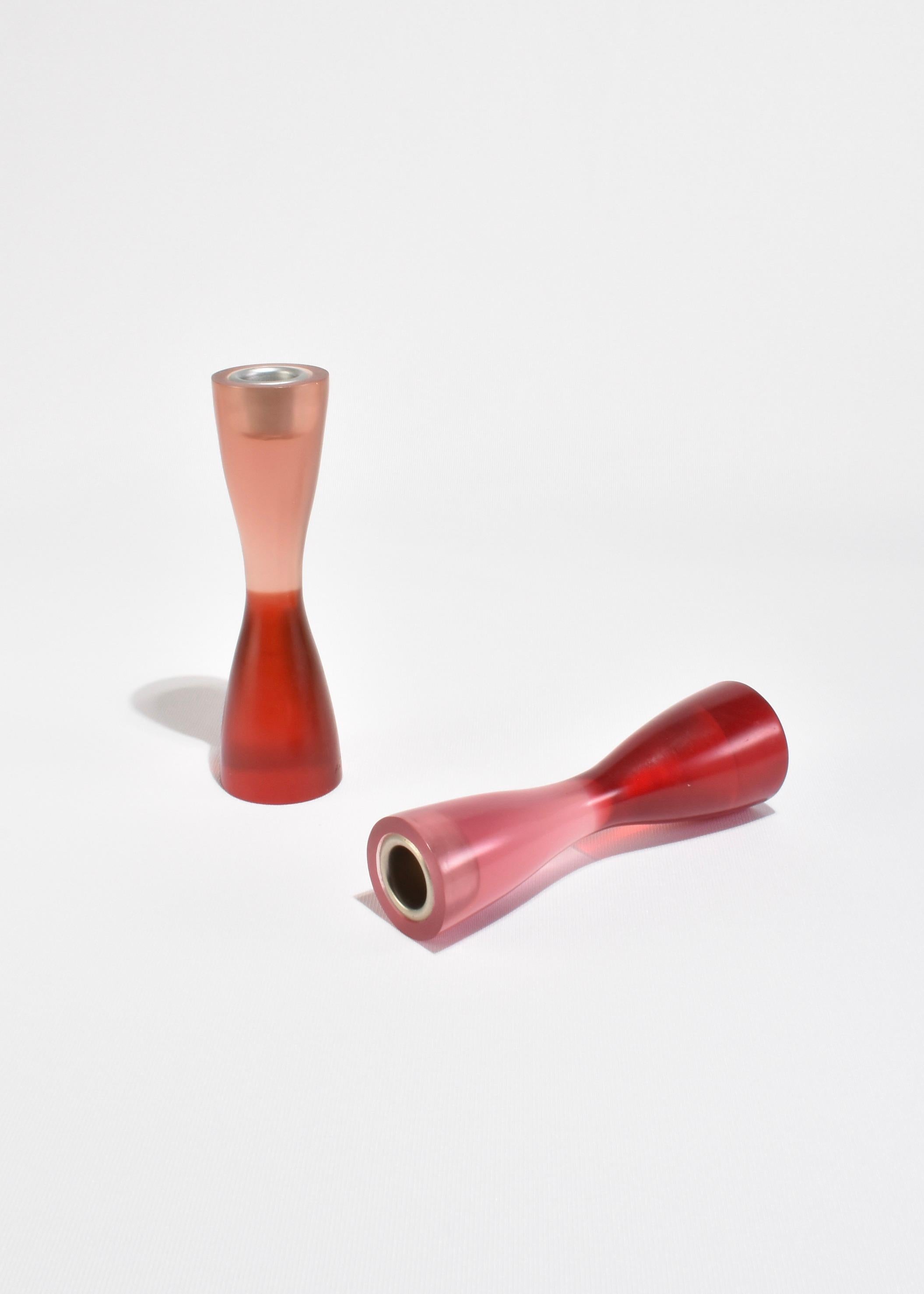 Vintage curvy resin candleholder set of two in pink and red, by Artecnica. Holds a taper candle measuring 1