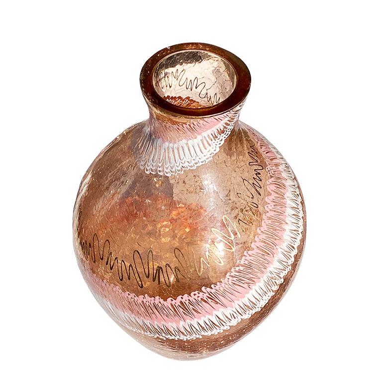 A pretty pink crackled glass vase with pink and white marbled stylized painted squiggles around the body. This piece is very thick and will be fabulous on a side table filled with fresh flowers. 

Dimensions:
10