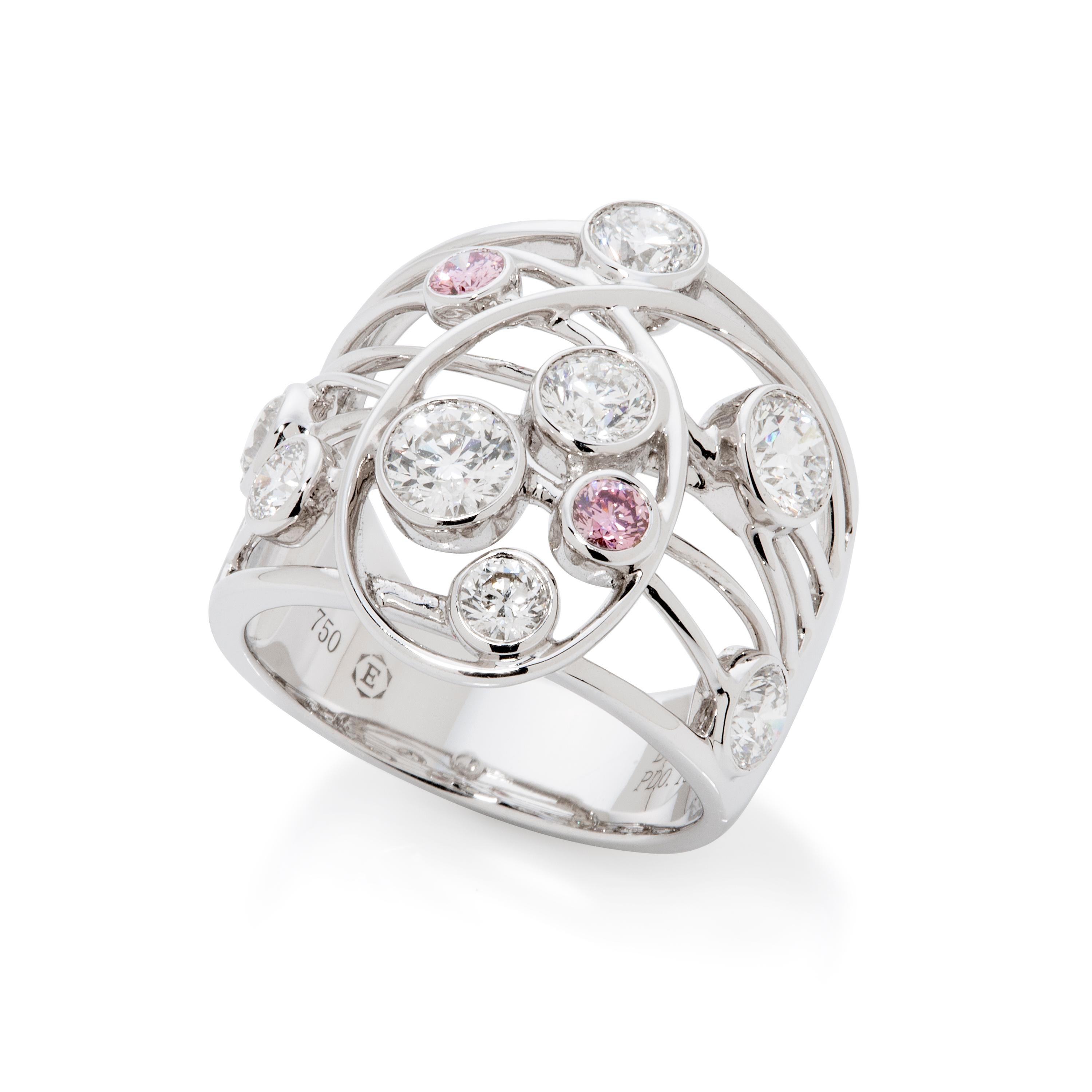 A 18K white gold statement dress ring featuring two round brilliant cut pink diamonds totalling 0.16 carats and eight round brilliant cut diamonds totalling 1.69 carats. The ring size is L and the total weight is 10.68 grams.

We are proud to