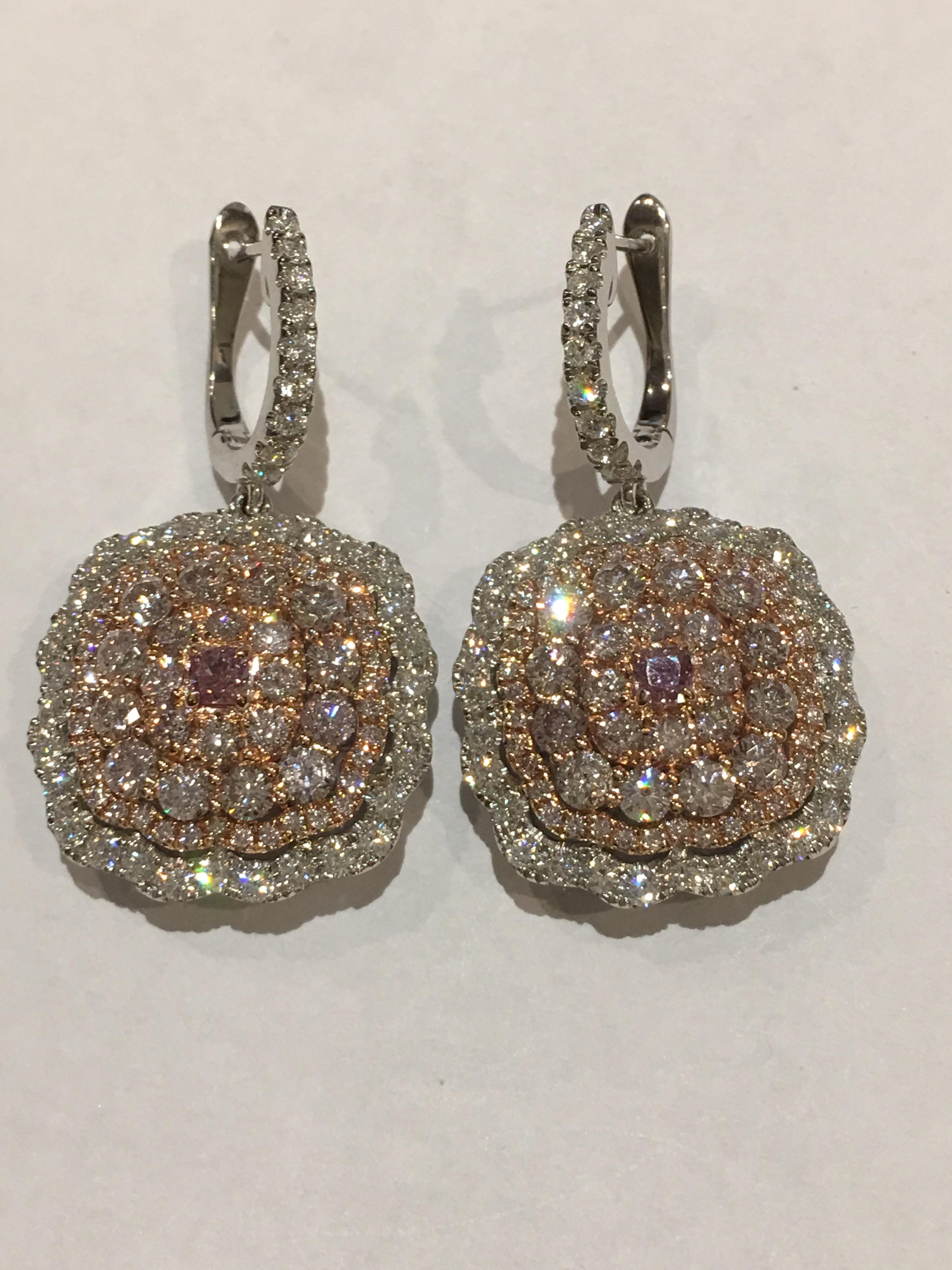 Round Cut Pink and White Diamond Set in 14 Karat Gold