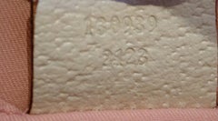 Rosa und weiße Gucci Handtasche