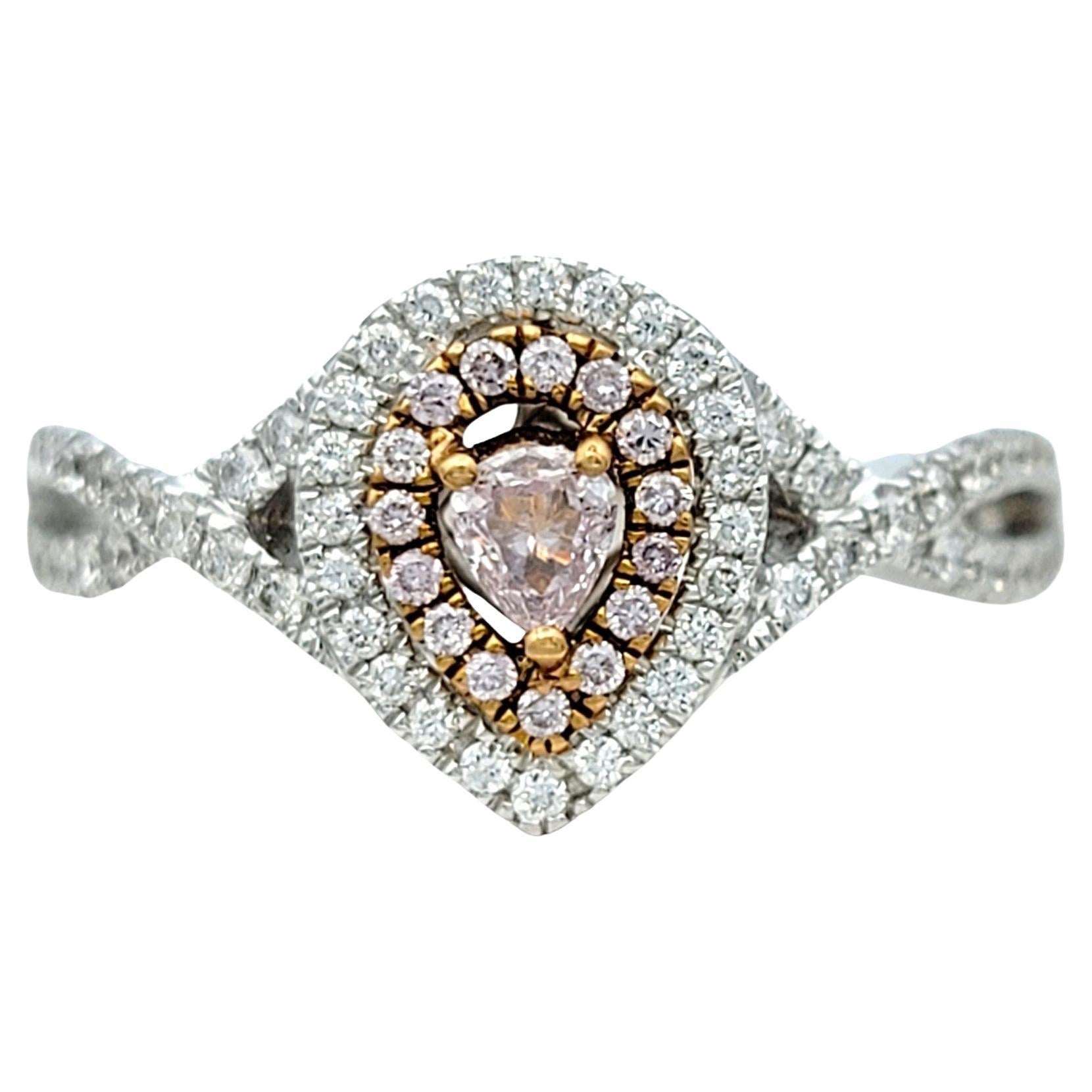 Contemporary Pink and White Pear-Shaped Diamond Double Halo Ring Set in 18 Karat White Gold For Sale