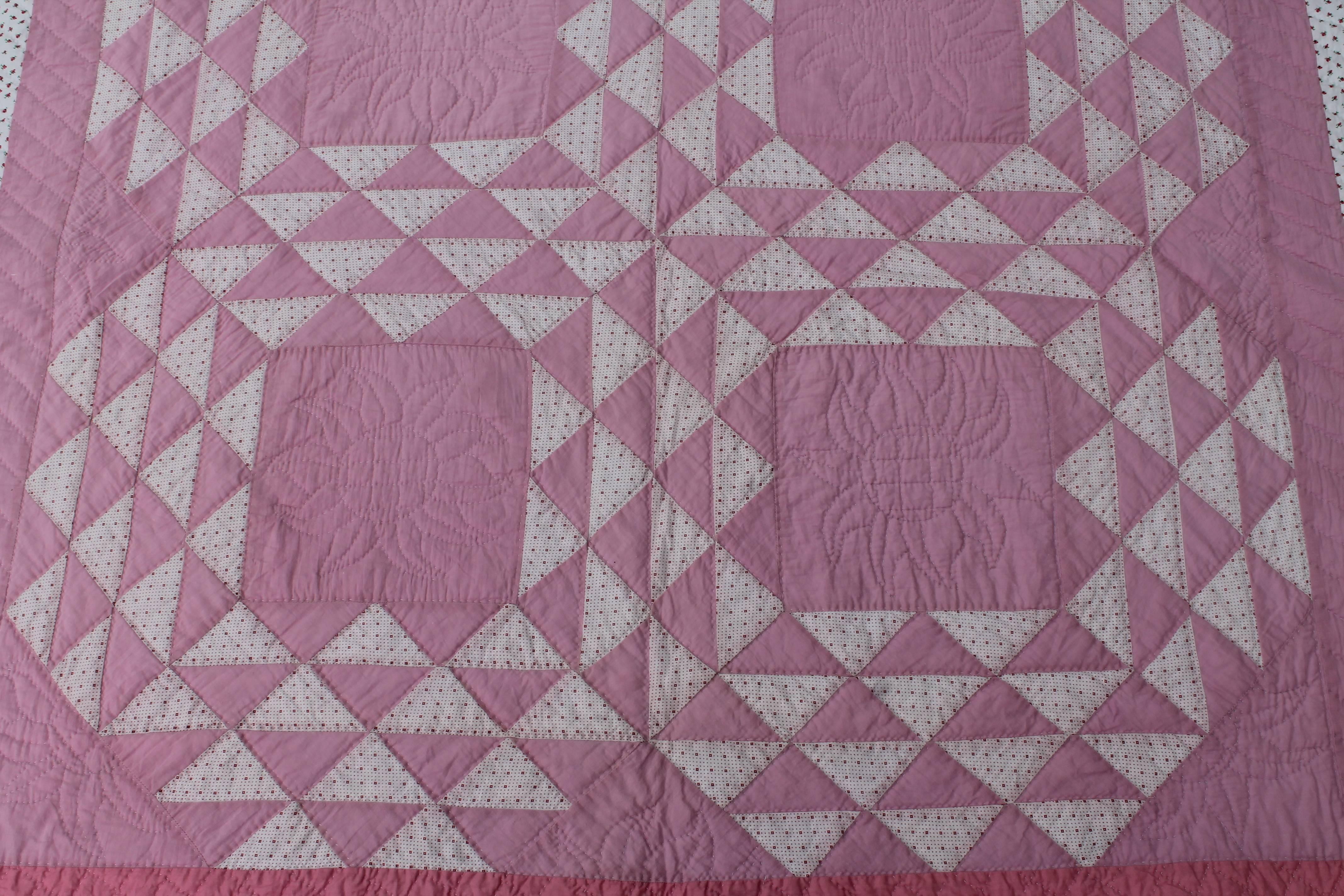 American Pink and White Quilt in Contained Flying Geese Pattern
