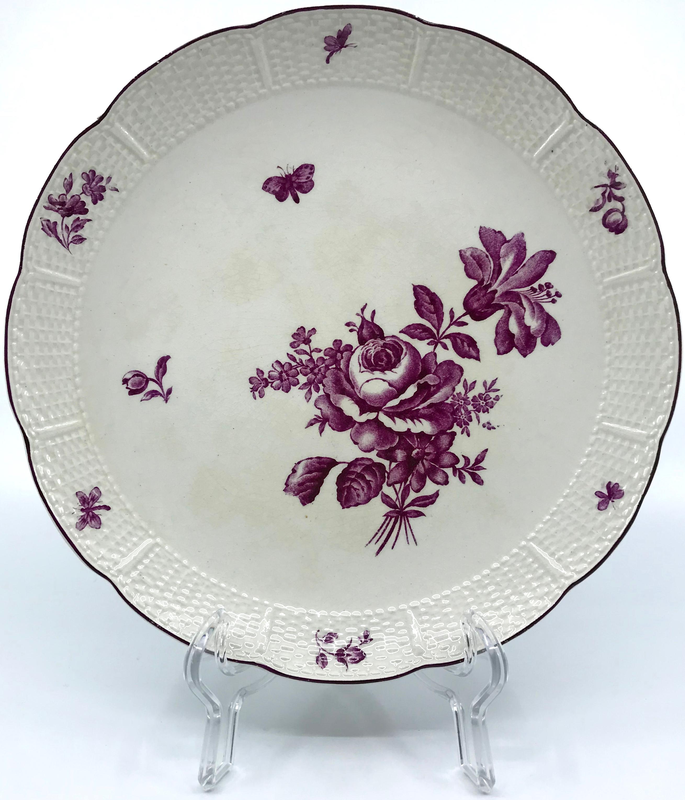 Magenta and white Wedgwood floral cake stand. Vintage Wedgwood low footed plate/cake stand in the Frankenthal pattern with magenta floral sprays and butterflies and basket-weave border and foot. Stamped Wedgwood, made for the French market, England,