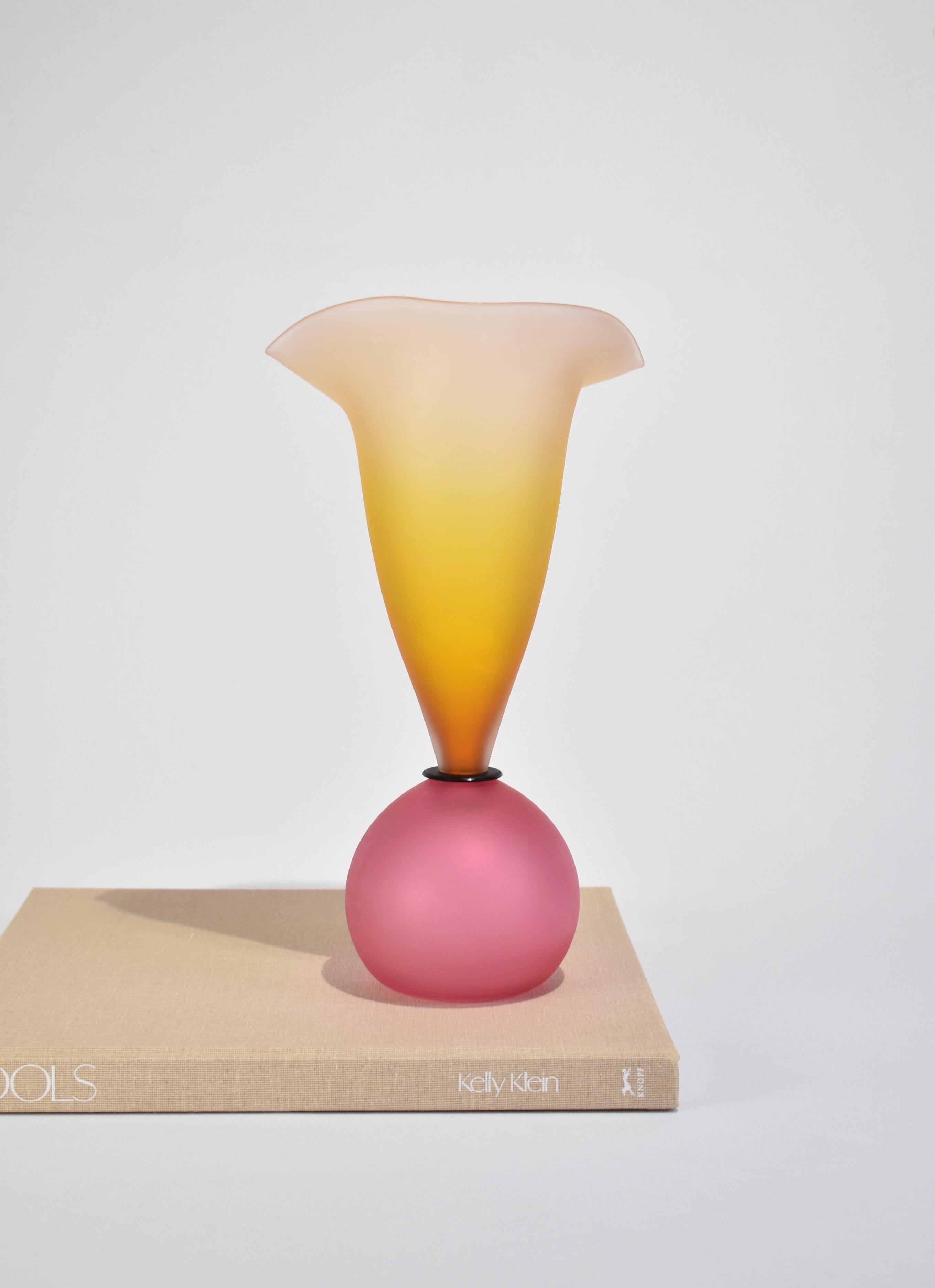 Stunning, blown glass statement vase in pink and yellow with a satin finish. Signed on base.