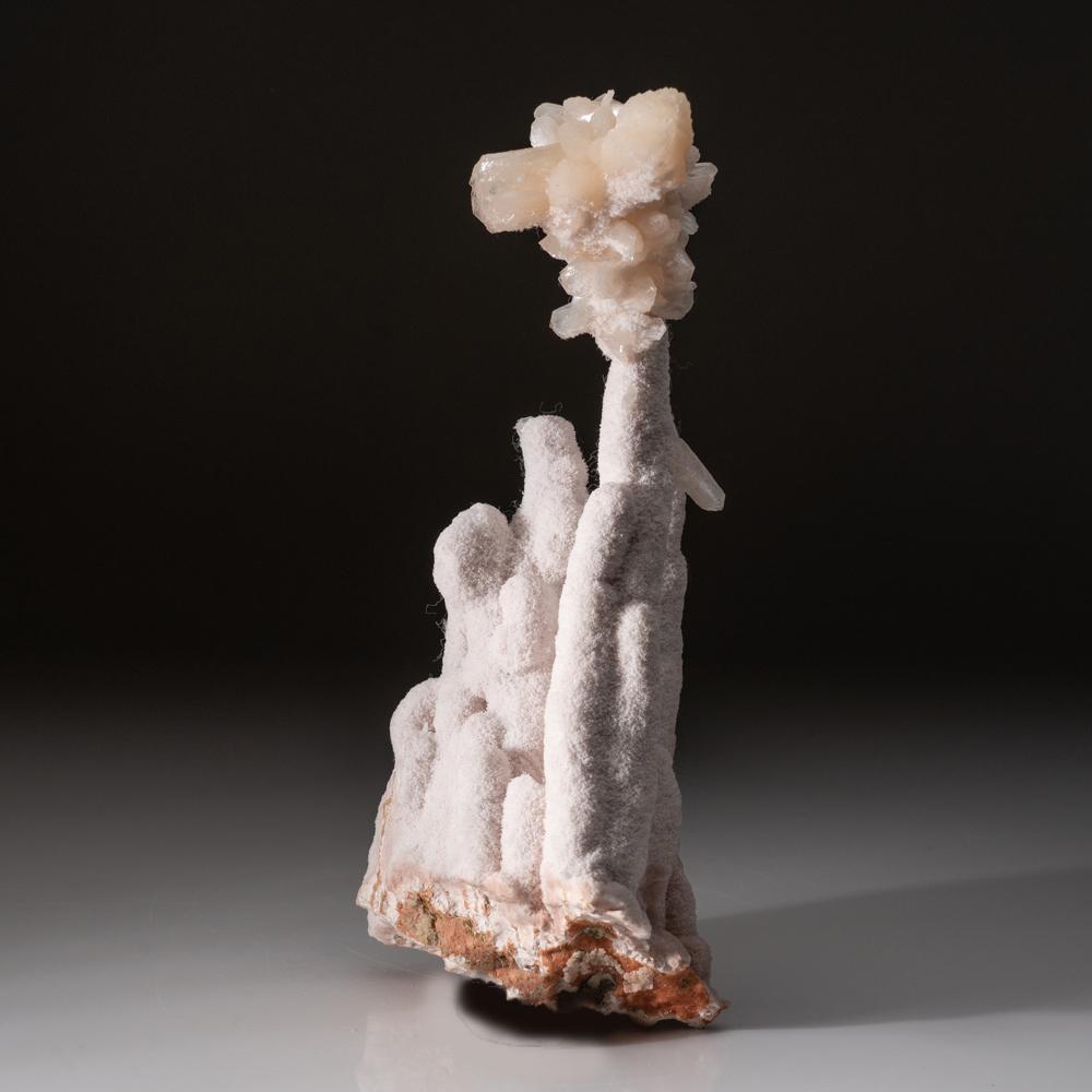 From Wenshan Mine, Wenshan Co., Yunnan Province, China Large Aesthetic pink stalactite clouds of aragonite with pink-to-colorless bowtie stilbite crystals. In pristine conditon, no damage. This unique combination of minerals makes this piece the