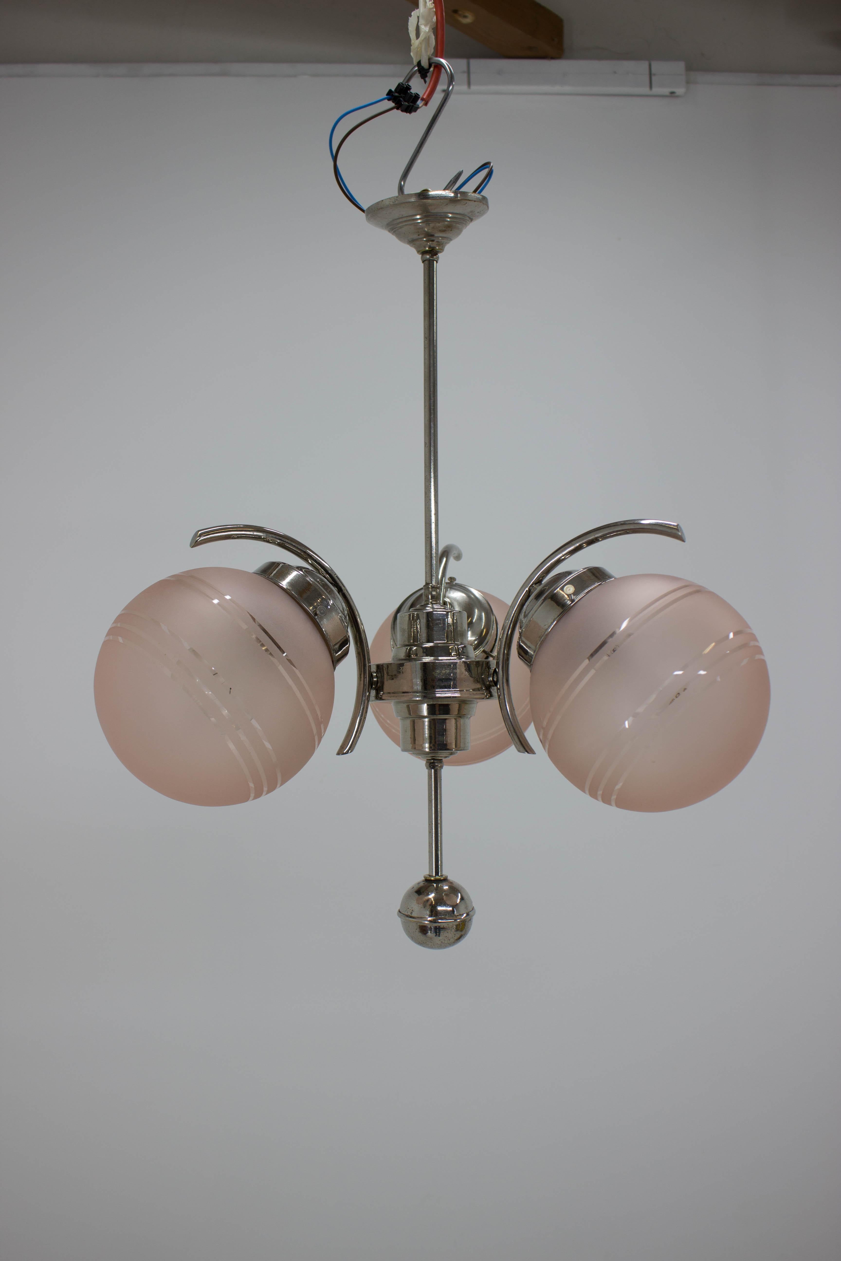 Art Deco chandelier with pink glass shades, circa 1930, chrome repolished, new wiring, very good condition, fully functional.