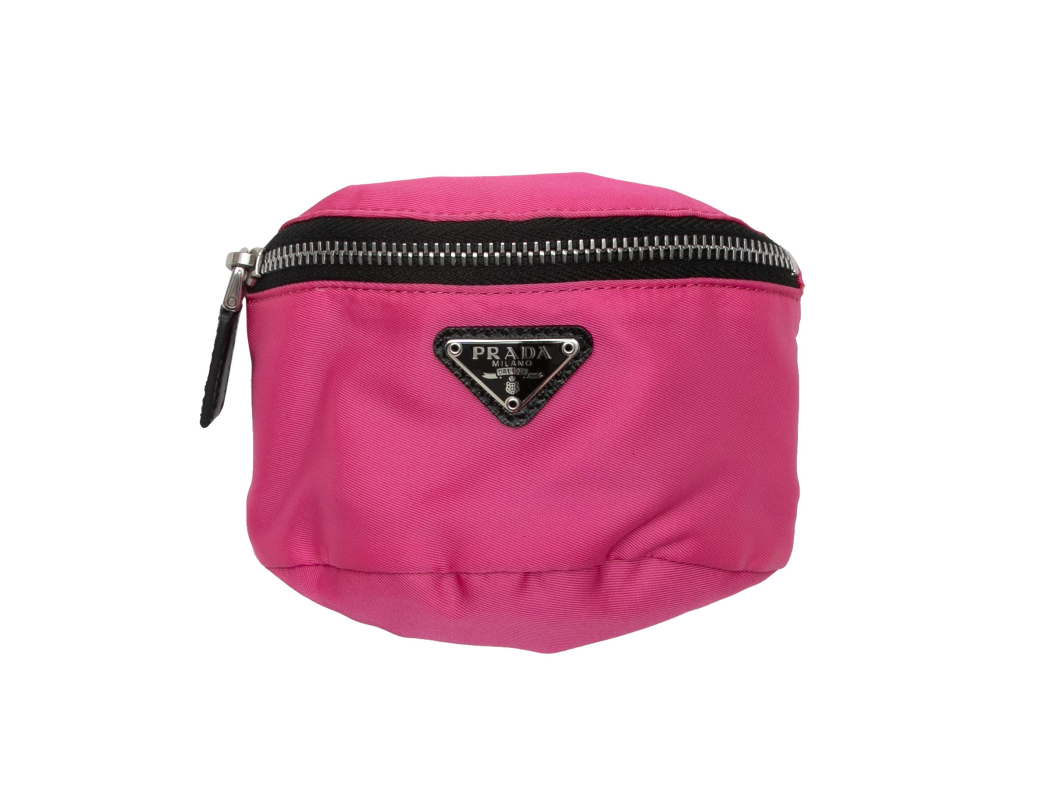 Pink and black Re-Nylon wristlet pouch by Prada. Adjustable band. Zip closure. 4
