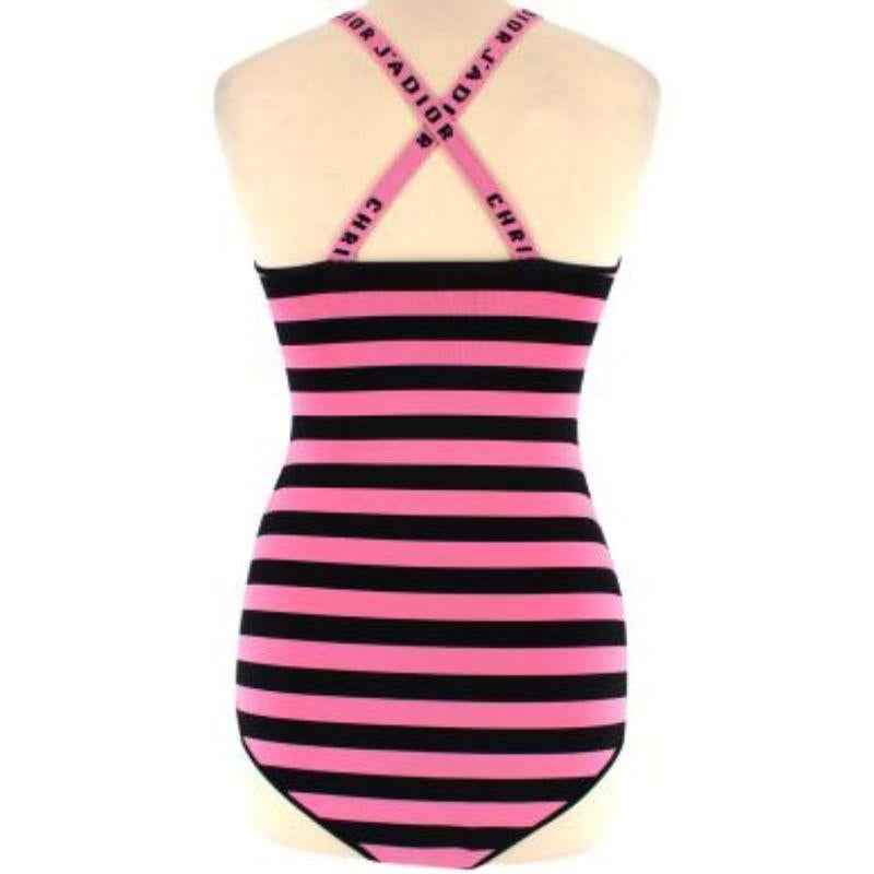 Dior Pink & Black Striped J'Adior Stretch Knit Bodysuit
 

 - Pink and black striped thick jersey knit bodysuit with logo straps
 - V-neck
 - J'adior logo straps with crossover 
 - Press stud bottom closure 
 

 Made in Italy
 80% viscose, 18%