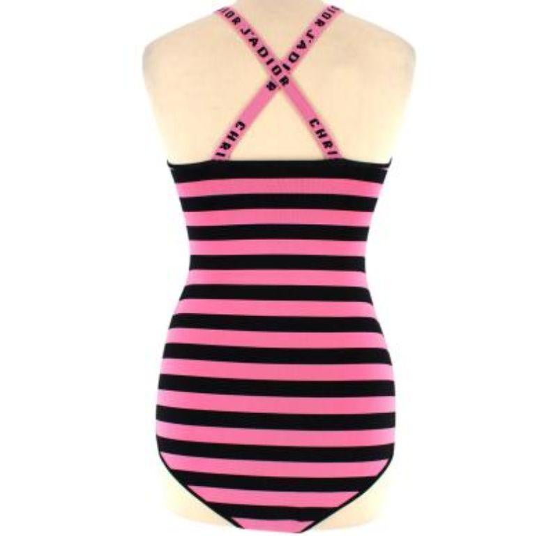 Dior Pink & Black Striped J'Adior Stretch Knit Bodysuit

- Pink and black striped thick jersey knit bodysuit with logo straps
- V-neck
- J'adior logo straps with crossover 
- Press stud bottom closure 

Made in Italy
80% viscose, 18% polyamide, 2%