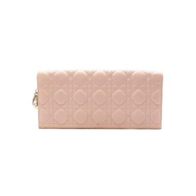 Pink Cannage Leather Lady Dior Clutch
 
 - Cannage topstitching 
 - Crafted in pink lambskin 
 - ABCDior hanging charm
 - Interior patch pocket 
 
 Materials:
 Lambskin 
 
 Made in Italy 
 
 9.5/10 excellent condition with slight scratch mark at