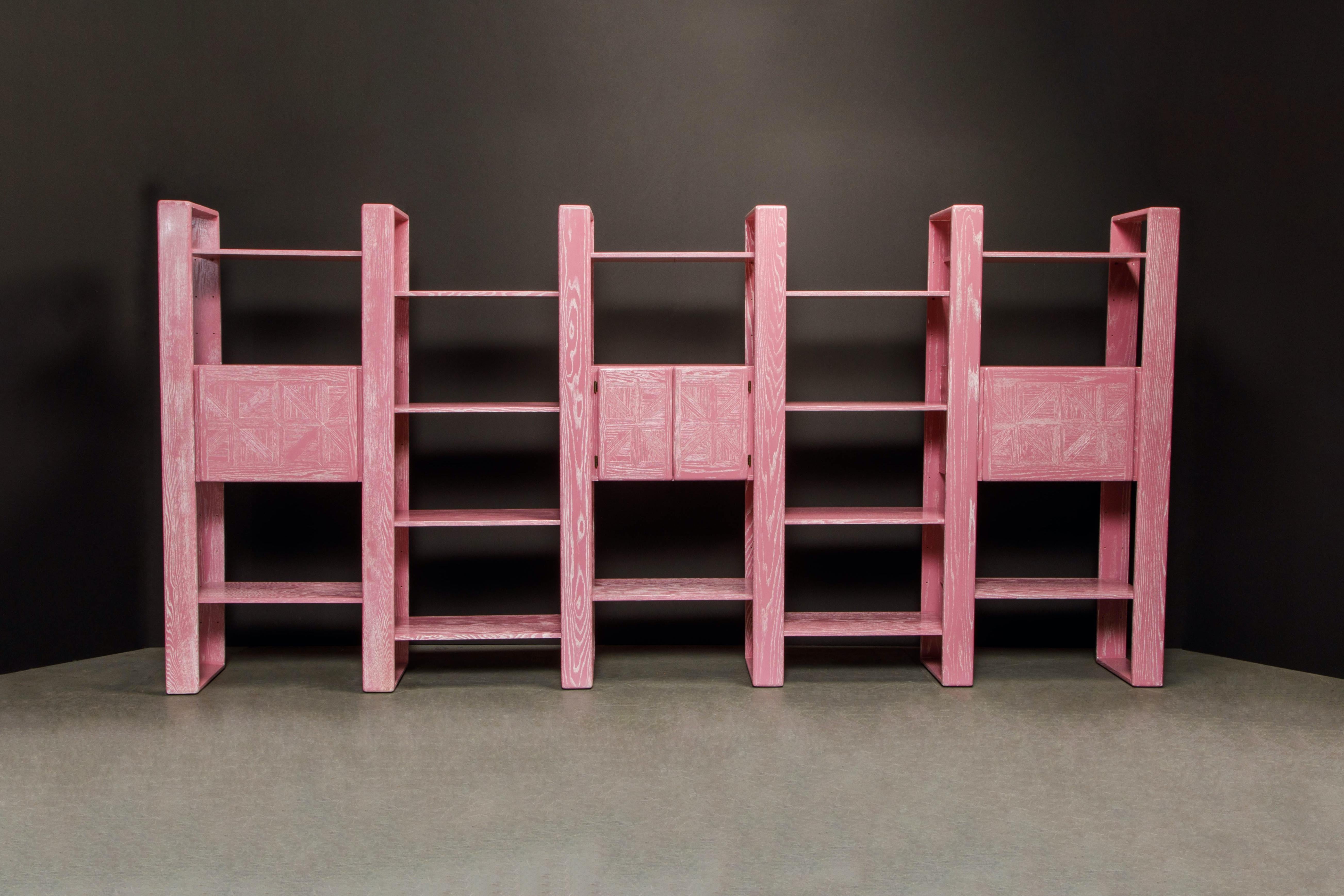 This absolute show-stopper modular bookcase refinished in gorgeous pink cerused oak is by Lou Hodges, designed and produced in California in the 1970s. You can configure this modular set in so many ways, also we have additional sections and shelves