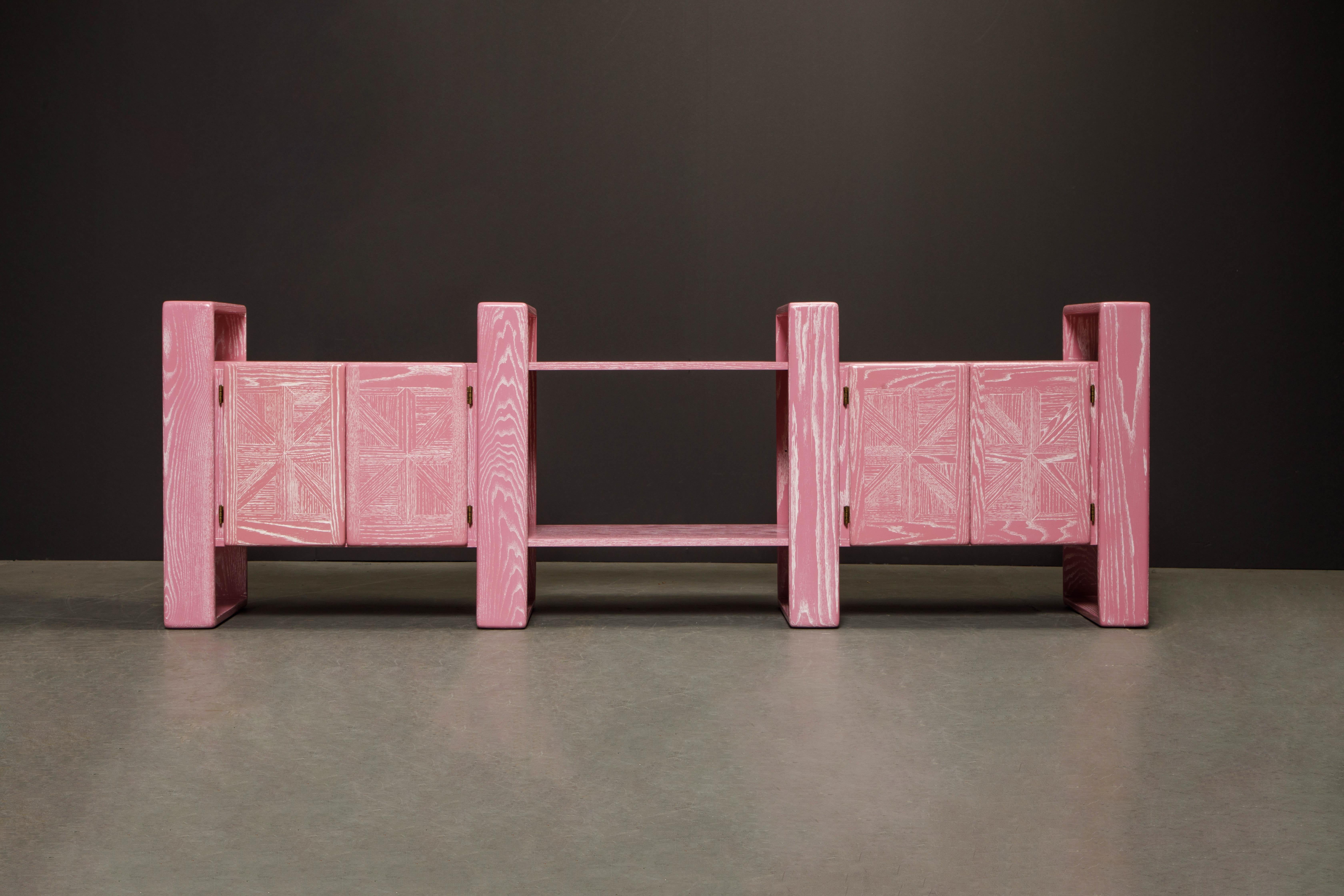 This absolute show-stopper modular media console system refinished in gorgeous pink cerused oak is by Lou Hodges, designed and produced in California in the 1970s. You can configure this modular set in so many ways, also we have additional sections