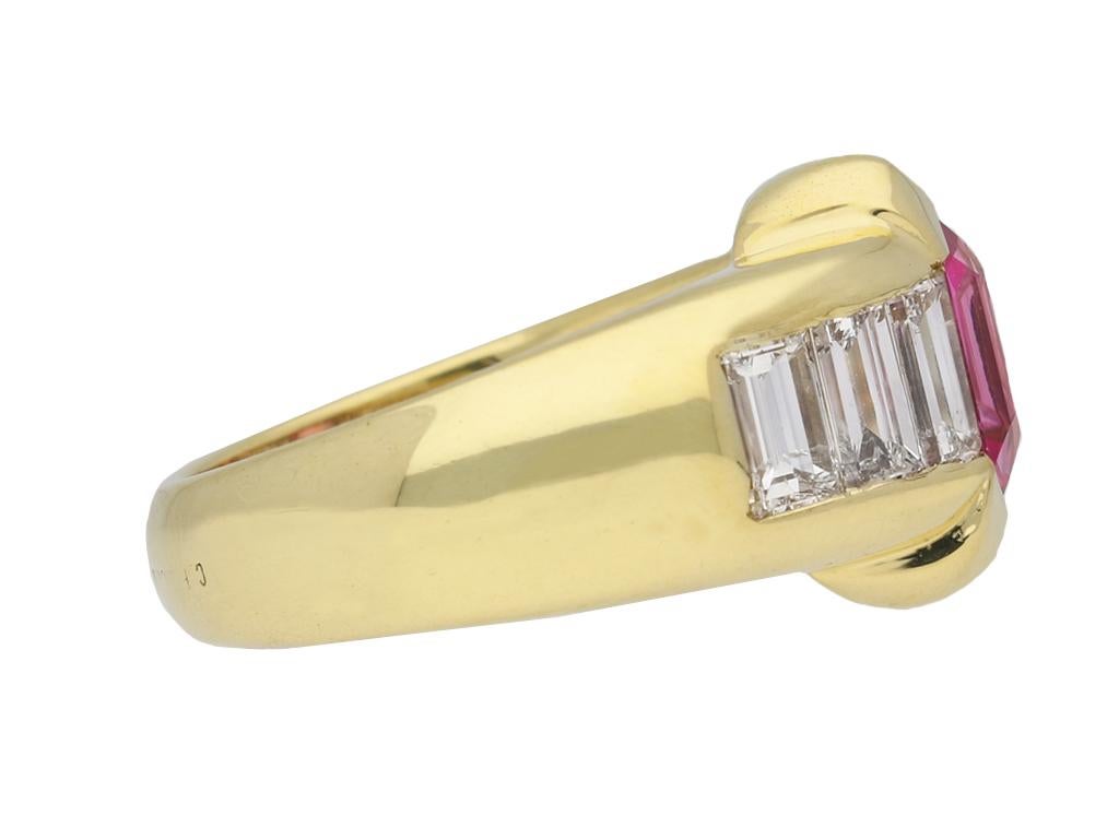 Pink Ceylon sapphire and diamond ring. Set to the centre with a rectangular emerald-cut natural unenhanced pink Ceylon sapphire in an open back rubover setting with an approximate weight of 2.62 carats, further set with six rectangular baguette cut