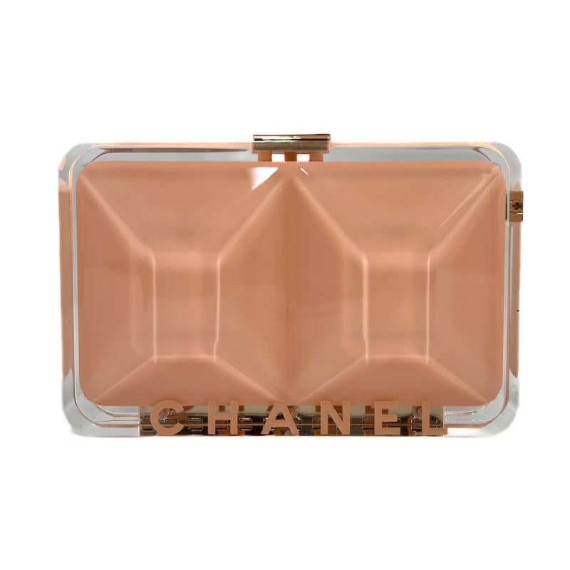 Rare Chanel pink plexiglass evening bag

Condition: very good
Made in France
Material : plexiglass
Interior : salmon pink smooth leather
Color: pale pink
Dimensions: 14 x 9 x 4 cm
Authenticity card: yes
Collection: Ready-to-Wear 2005
Year:
