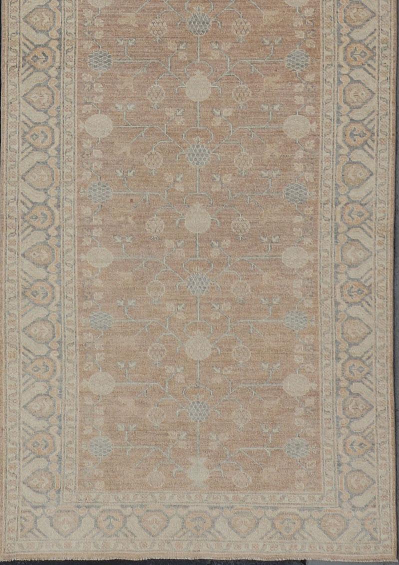 Khotan rug with pomegranate design. rug MP-1709-273 country of origin / type: Afghanistan / Khotan, circa Early-21st Century.

Measures: 4'0 x 15'5.

This Reproduction Khotan features a geometric pomegranate design flanked by a repeating pattern