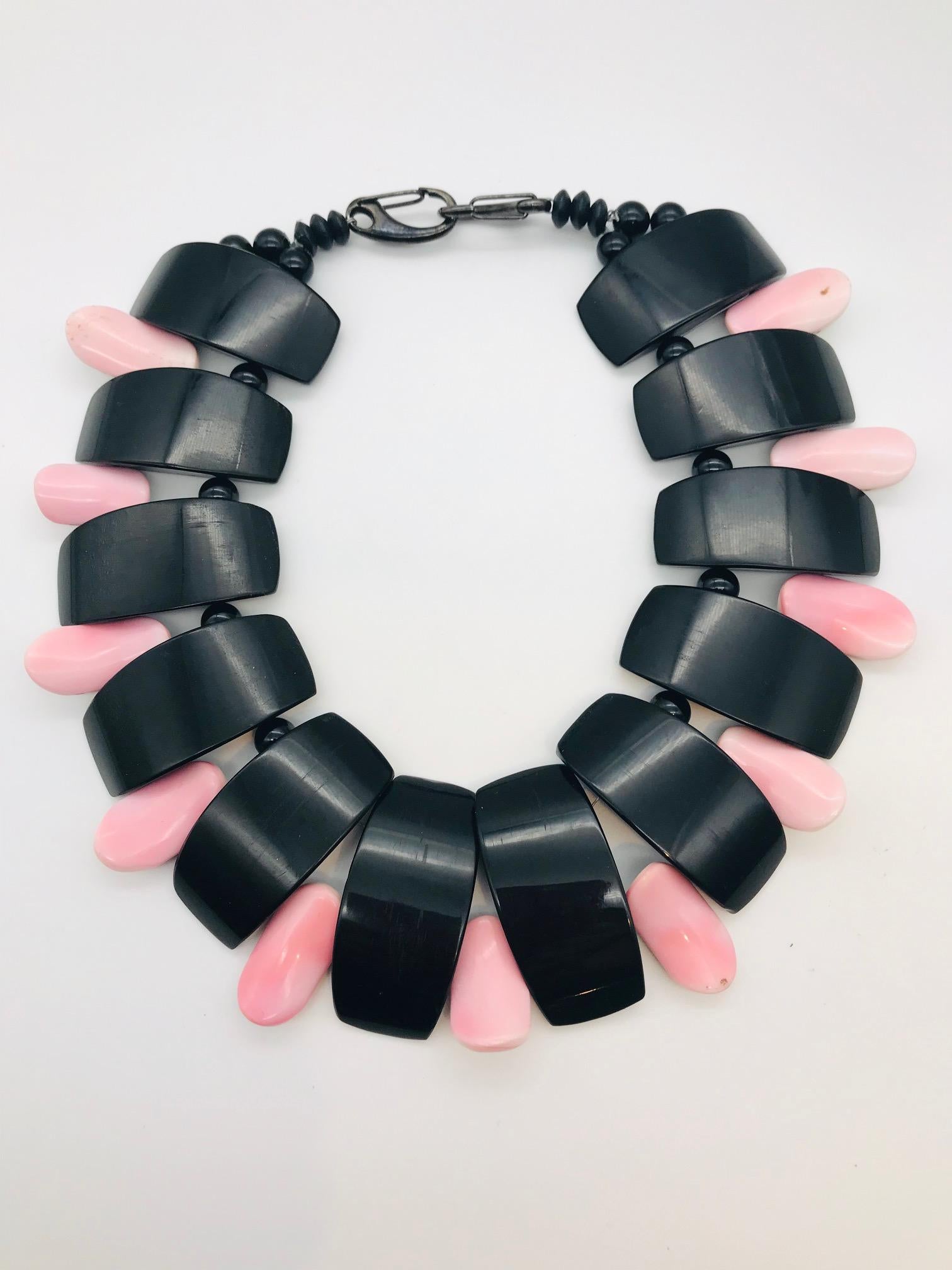 
This Statement Necklace made from Conch porcelain like pink hand cut beads is eco –luxe very suitable for fall and winter wear!
The pink Conch is a shell from Caribbean Sea and is harvested wild as a by-product of sustainable food aquaculture. The