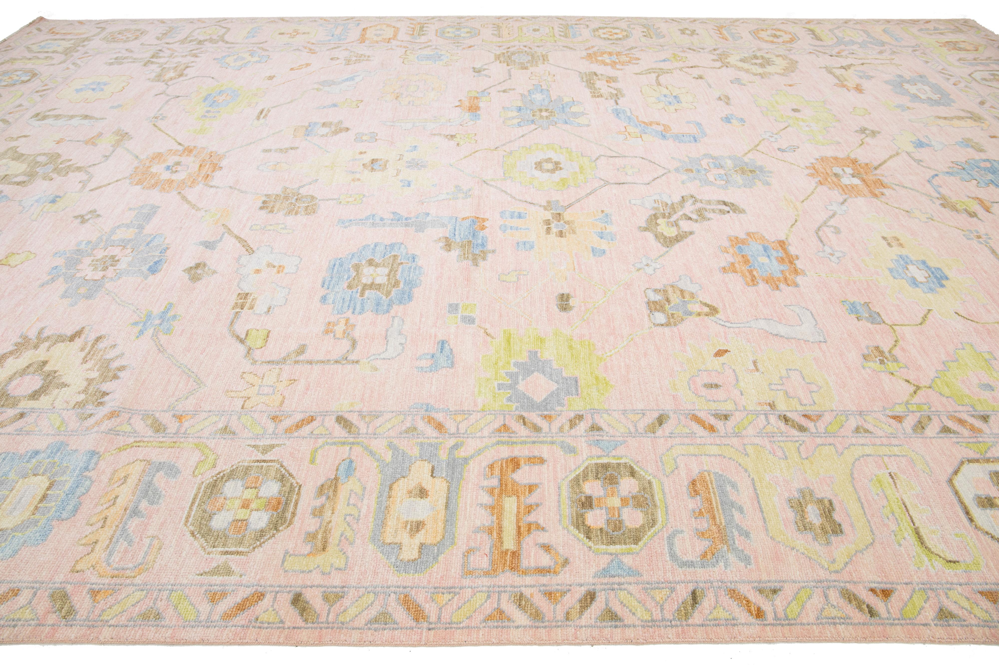 Hand-Knotted Pink Contemporary Oushak style Wool Rug Handmade Features a Floral Design For Sale
