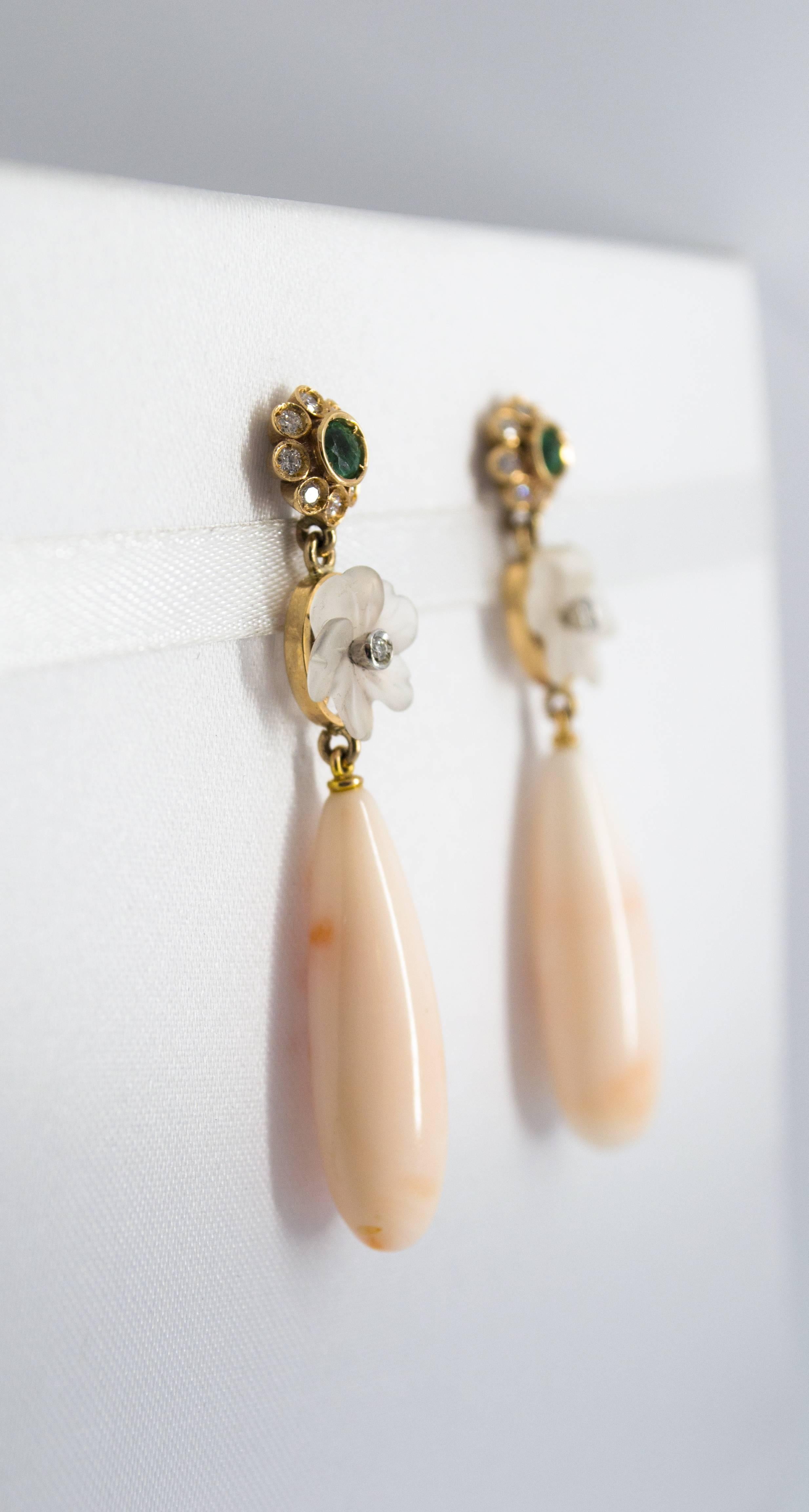 These Earrings are made of 14K Yellow Gold.
These Earrings have 0.40 Carats of Diamonds.
These Earrings have 0.30 Carats of Emeralds.
These Earrings have also Rock Crystal and Pink Coral.
All our Earrings have pins for pierced ears but we can change