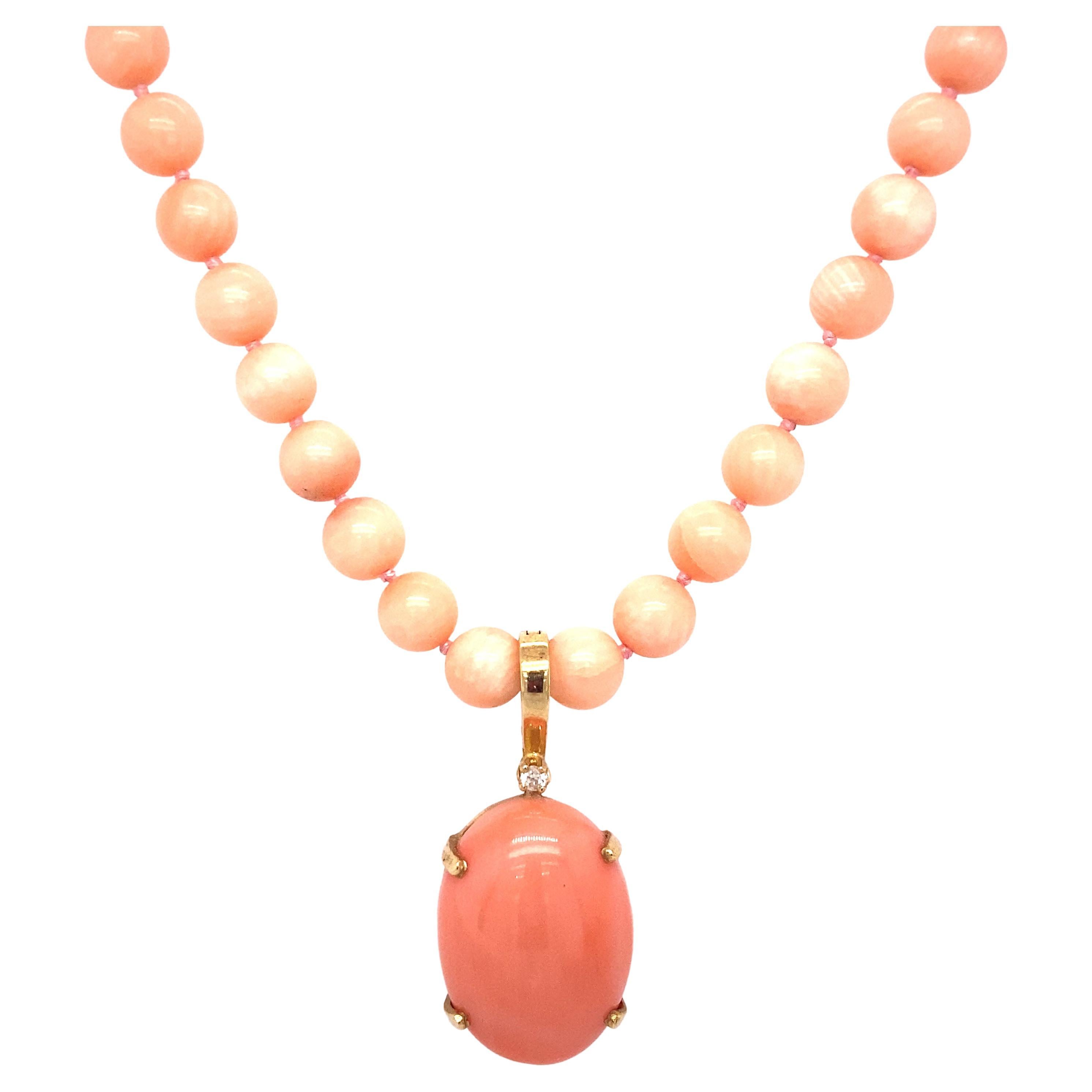 Pink Coral Beaded Necklace with Oval Enhancer in 18 Karat Gold For Sale