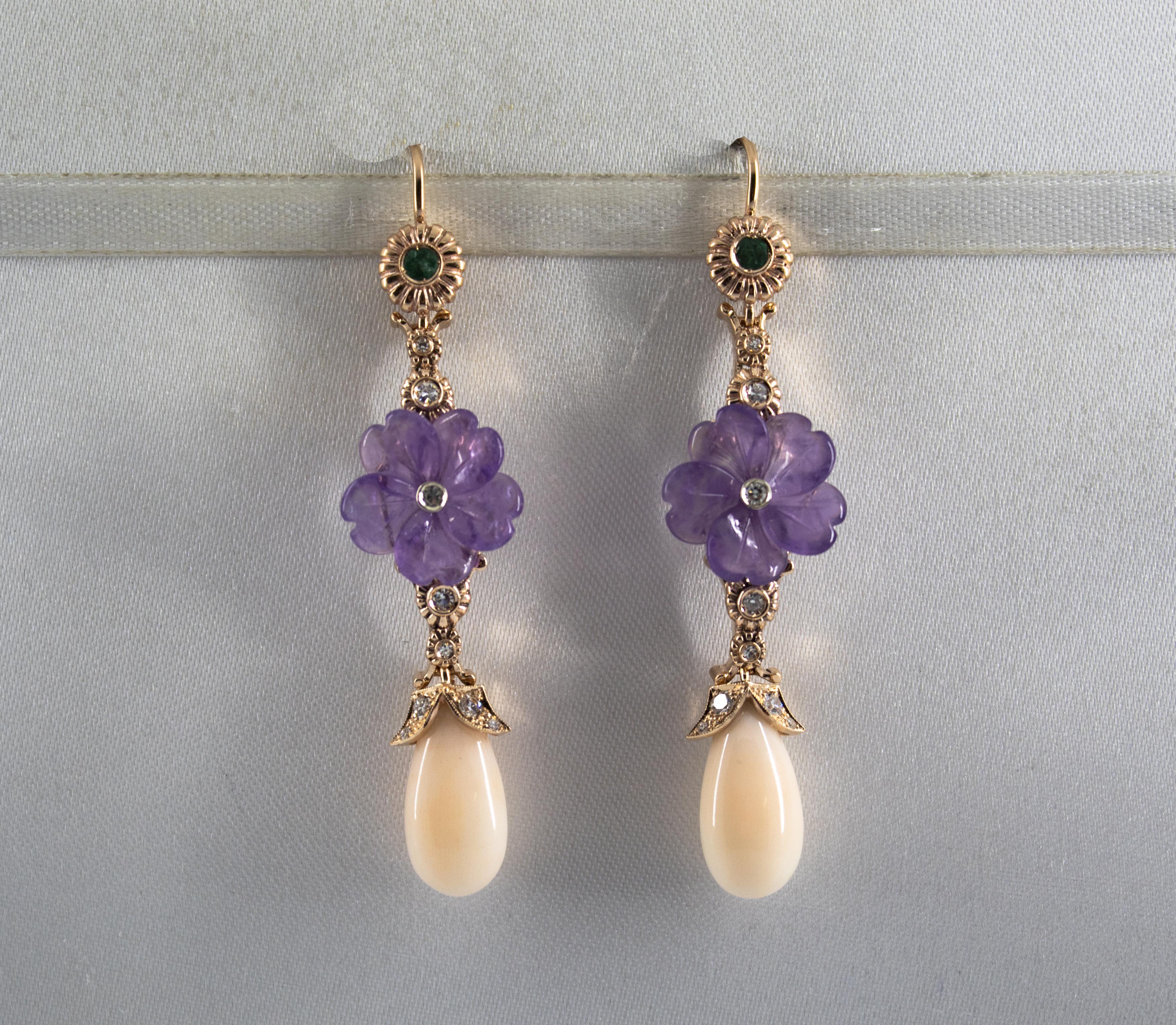 These Stud Earrings are made of 14K Yellow Gold.
These Earrings have 0.35 Carats of White Brilliant Cut Diamonds.
These Earrings have 0.10 Carats of Emeralds.
These Earrings have also Pink Coral and Amethyst.

All our Earrings have pins for pierced