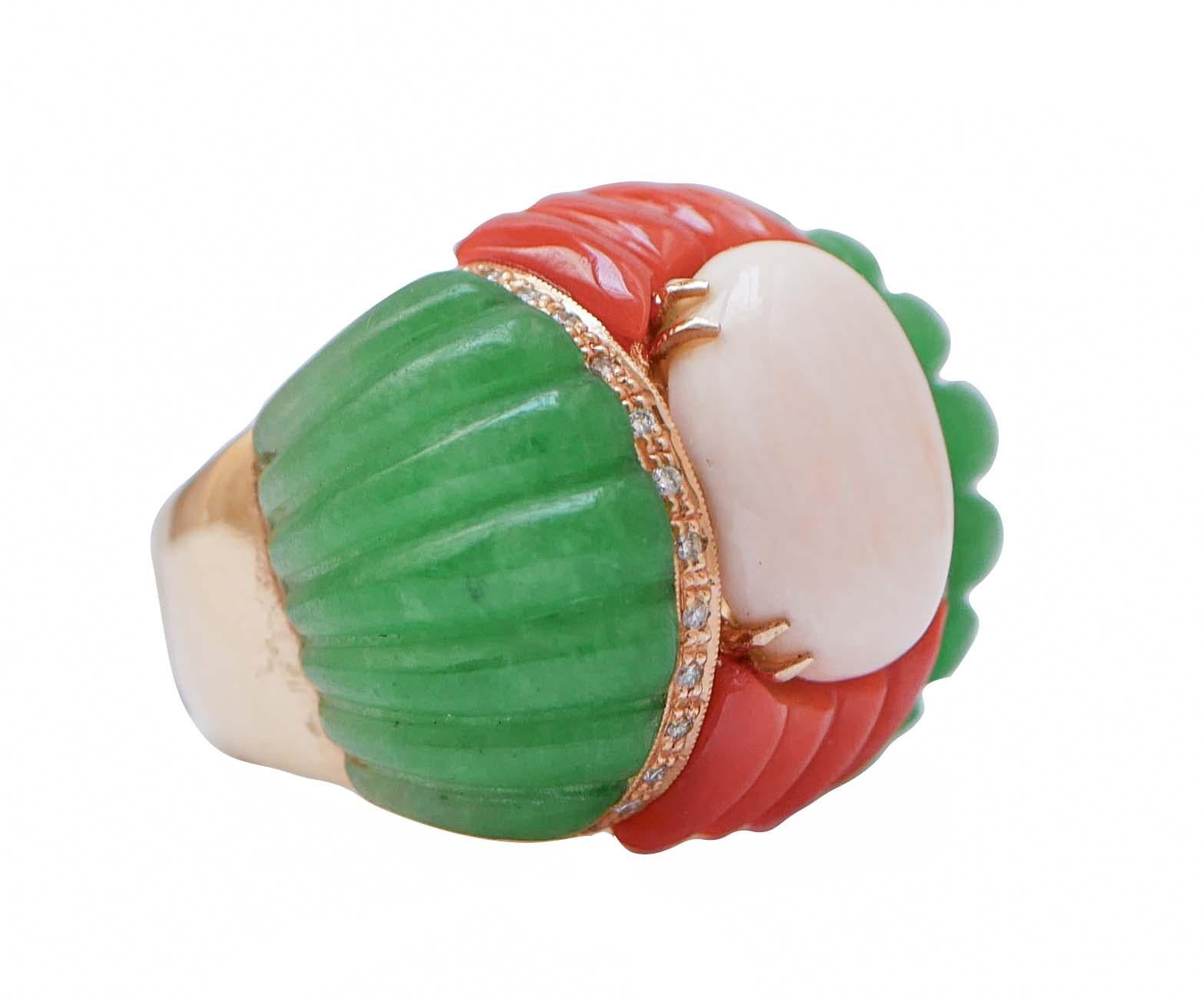 Retrò ring in 14 kt rose gold structure mounted with a central pink coral surrounded by red coral, jade and diamonds.
This ring was totally handmade by Italian master goldsmiths and it is in perfect conditions.
Diamonds 0.28 ct
Coral 2.90 gr
Jade