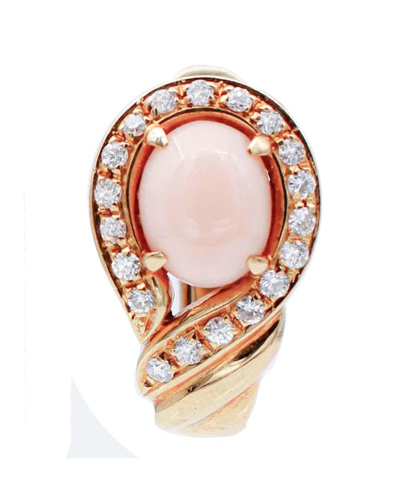 SHIPPING POLICY: 
No additional costs will be added to this order. 
Shipping costs will be totally covered by the seller (customs duties included).

Elegant stud earrings in 18 karat yellow gold mounted with an oval pink coral surrounded by