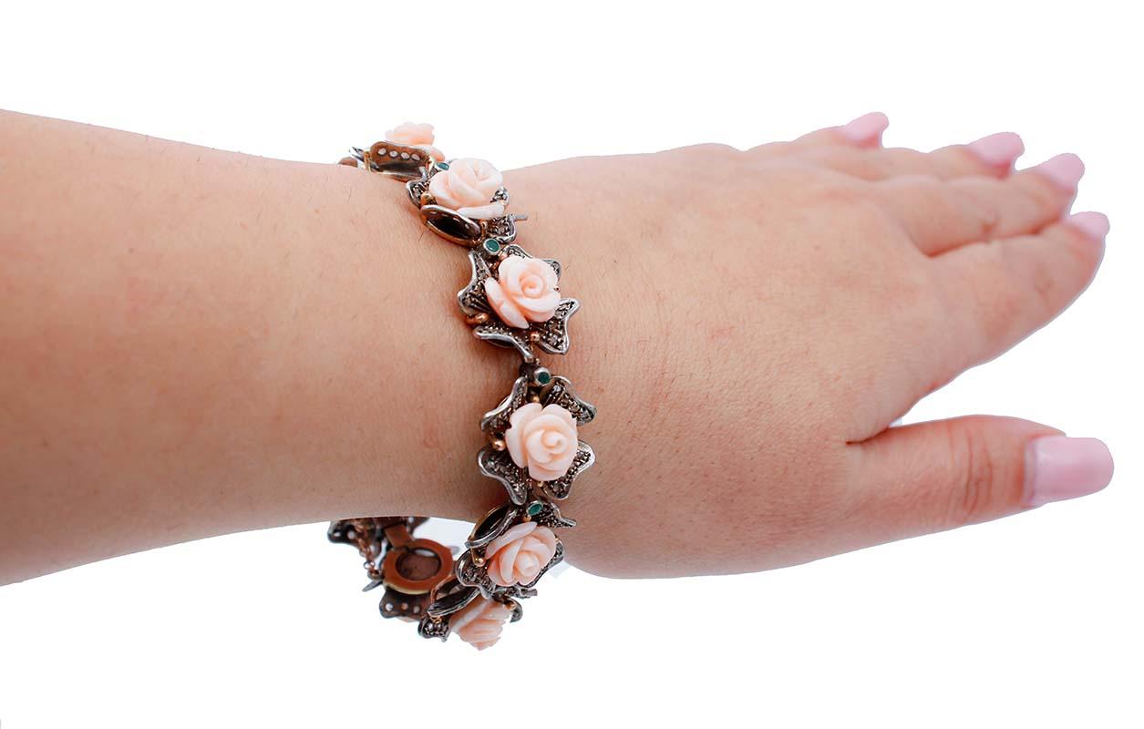 Mixed Cut Pink Corals Flowers, Diamonds, Emeralds, 9 Karat Rose Gold and Silver Bracelet For Sale