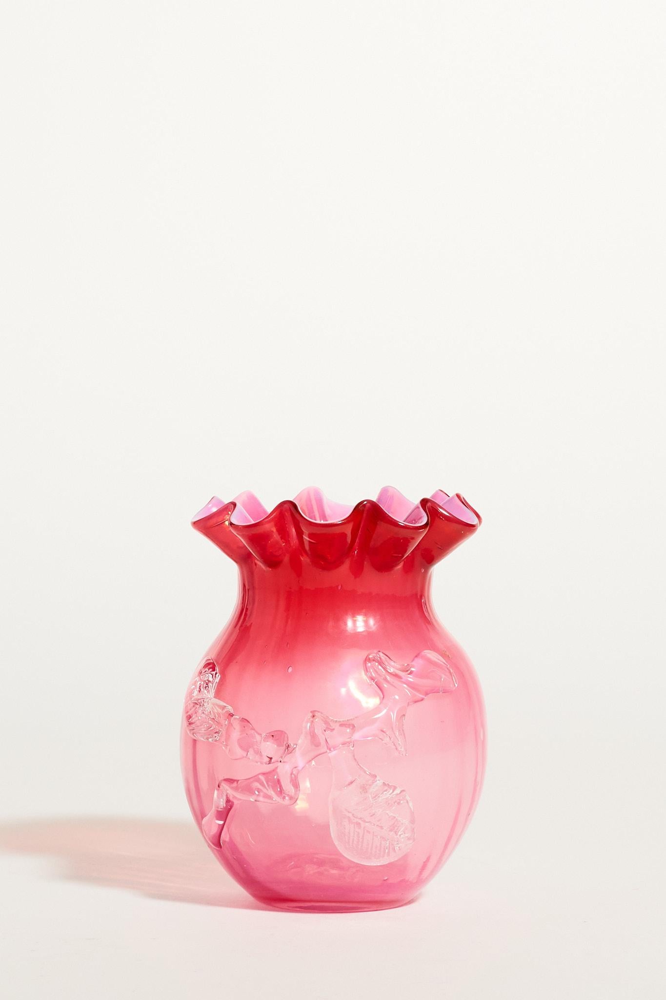 Ruffle rim bud vase with ombré cranberry pink to light pink glass.
