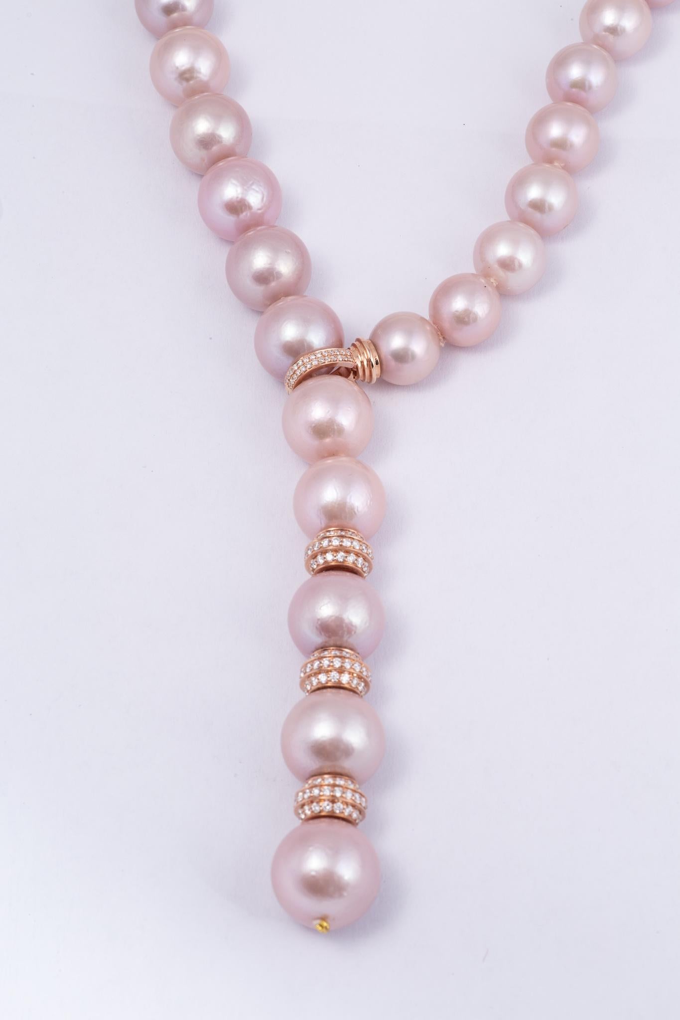 Very unusual in size and quality natural color pink cultured pearl 