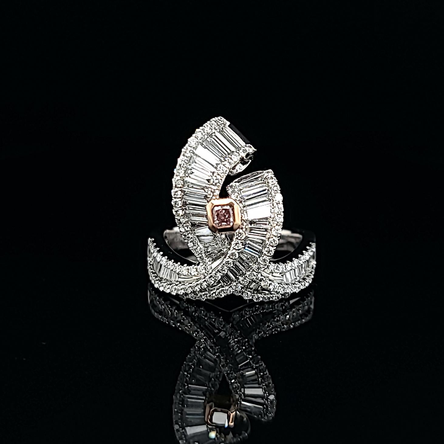 Argyle Pink Diamond 18k White Gold Rose Gold Ring by Kristin Hanson. A gentle and soft wind can be a game-changer, mood lifter, and serene. The light blow of nature's fresh breeze is a feeling, an emotion, and an earthly pleasure that everyone can