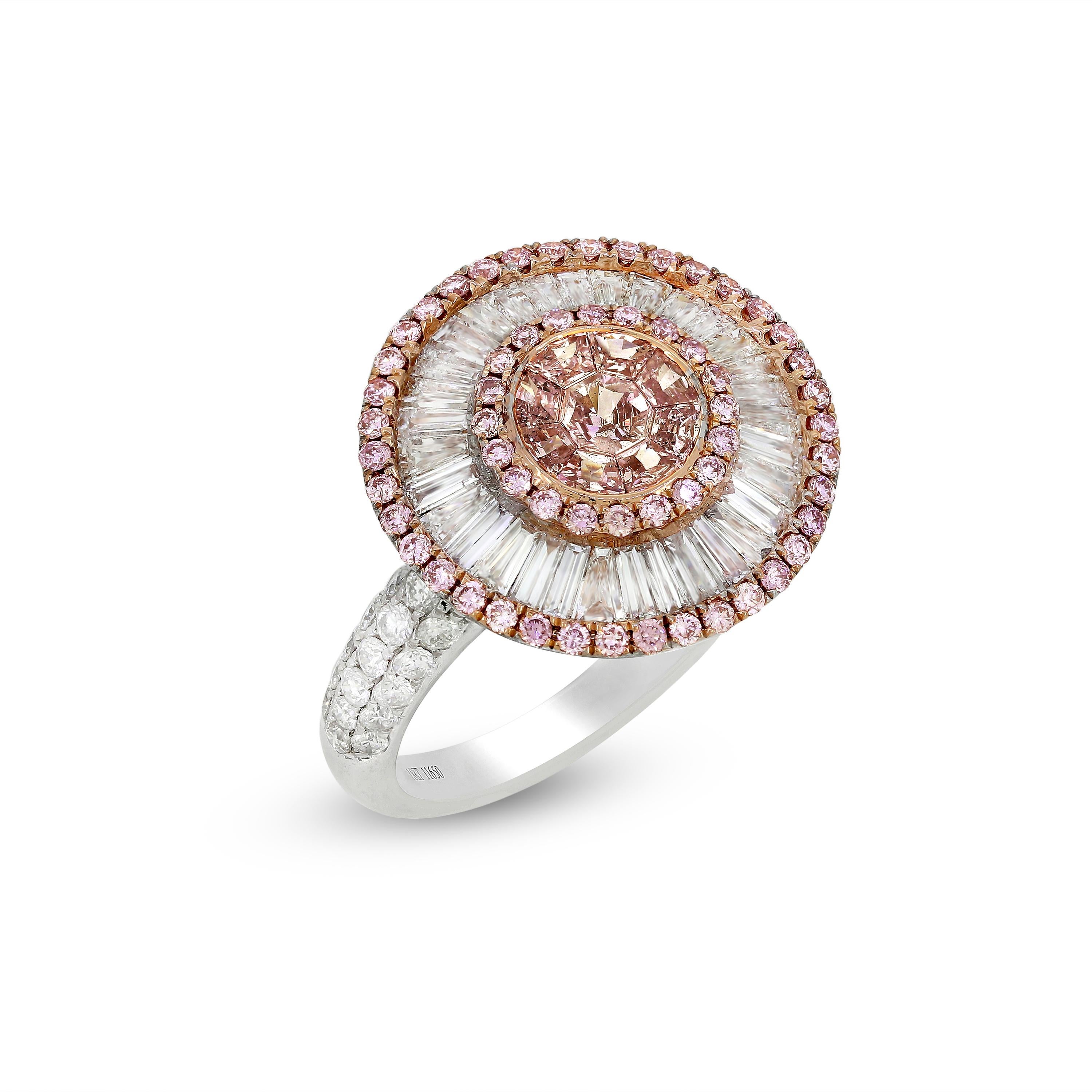 Sparkling baguette diamonds and stunning pink Diamonds come together to make this ring a gorgeous piece of jewelry. The design is at once alluring and eye-catching because of the beautifully clustered Diamonds. Accented with pave set diamonds on the
