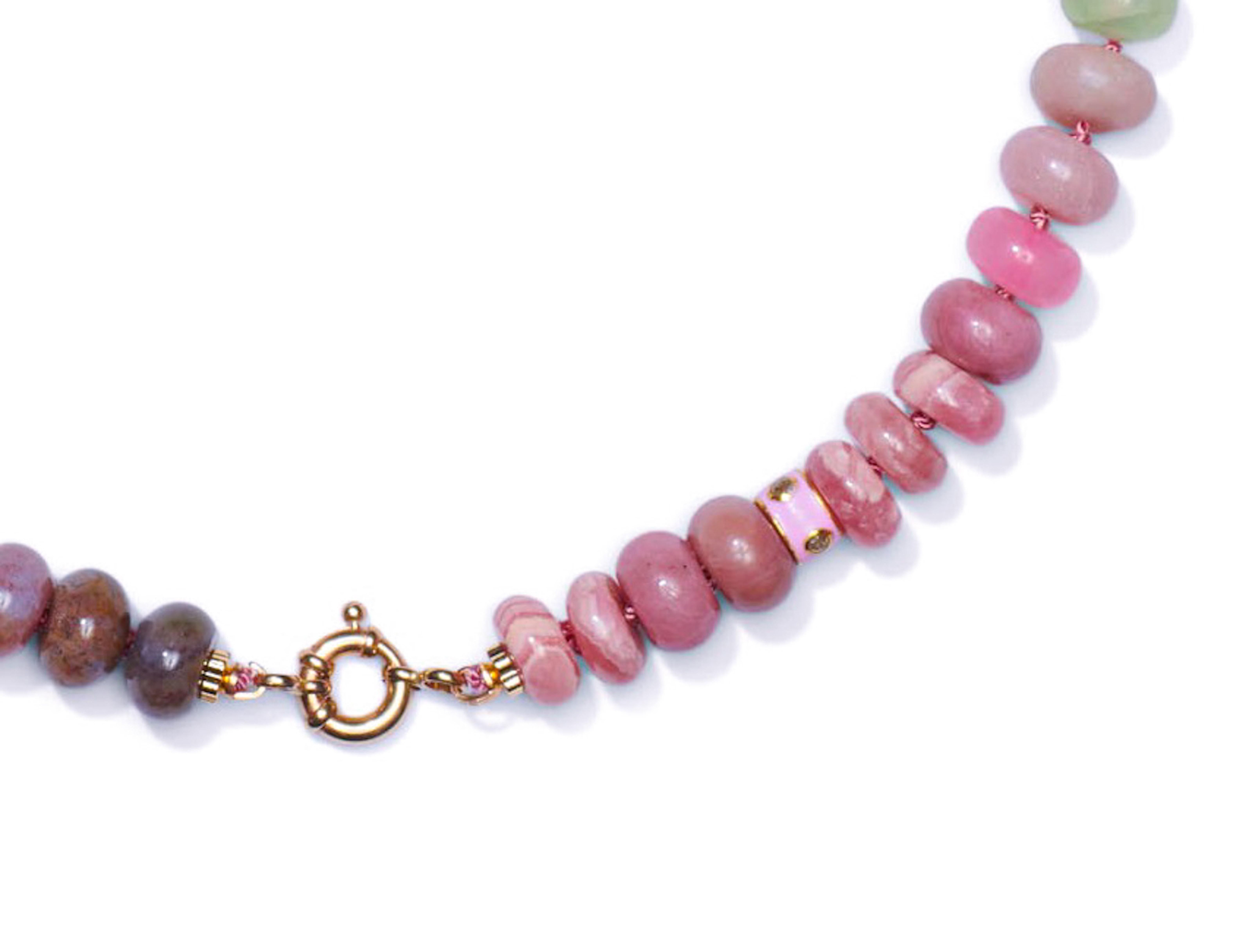 Exquisite precious gemstone beaded necklace enriched with a large variety of gemstones such as:

• Ethiopian opal
• Peridot
• Lace Agate
• Aventurine
• Kunzite
• Pink opal
• Strawberry quartz
• Rose quartz
• Aventurines
• Argentinian Rhodochrosite
•