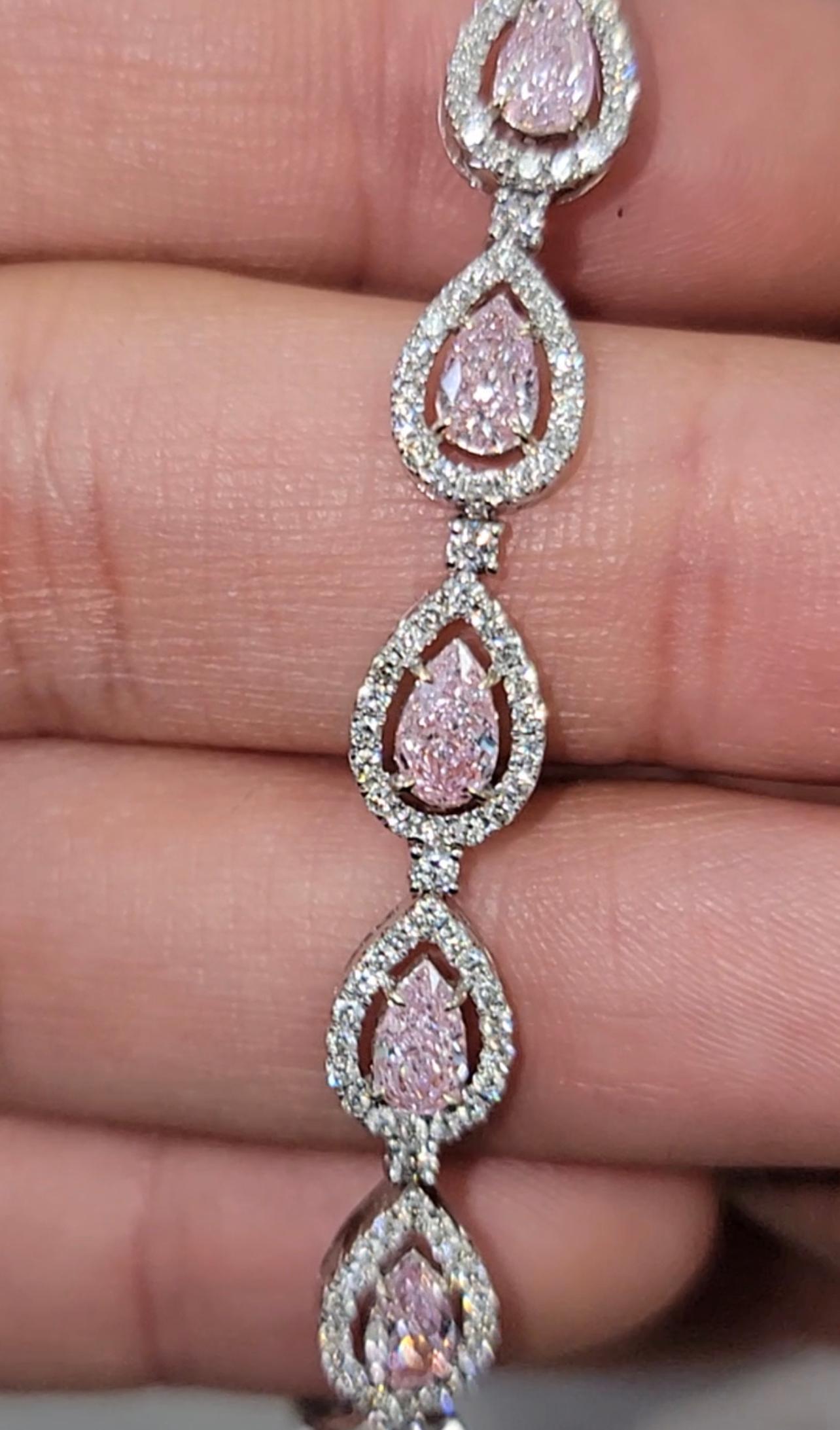 Gorgeous bracelet with 4.59cts of Pink Diamond Pear shapes with sweet color, full of life and no bow ties
2.22ct of white rounds

Making Extraordinary Attainable with Rare Colors
