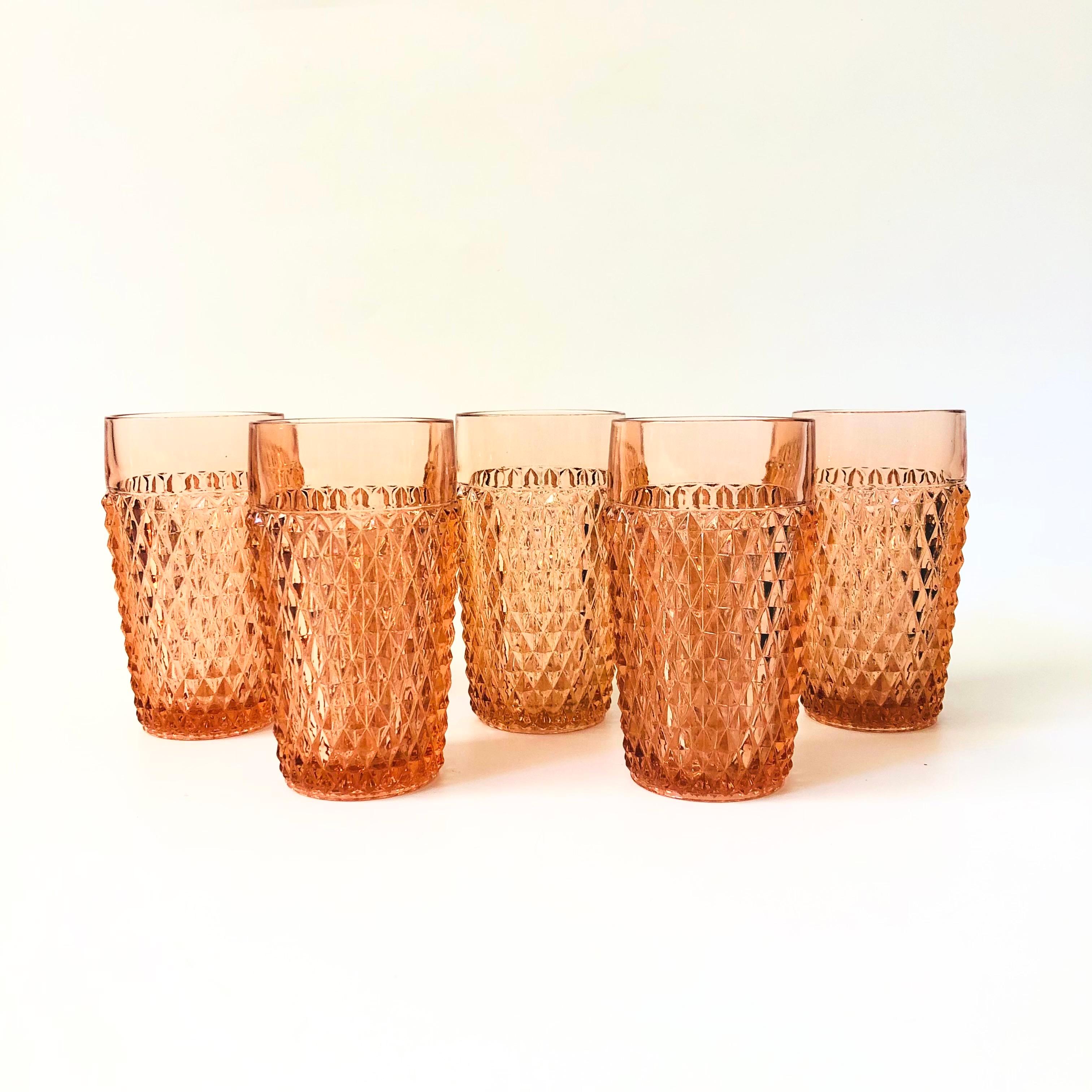 A set of 5 vintage tall tumblers in lovely textured pale pink glass. Made in the diamond point pattern by Indiana Glass. Perfect for using as water glasses or for cocktails.

