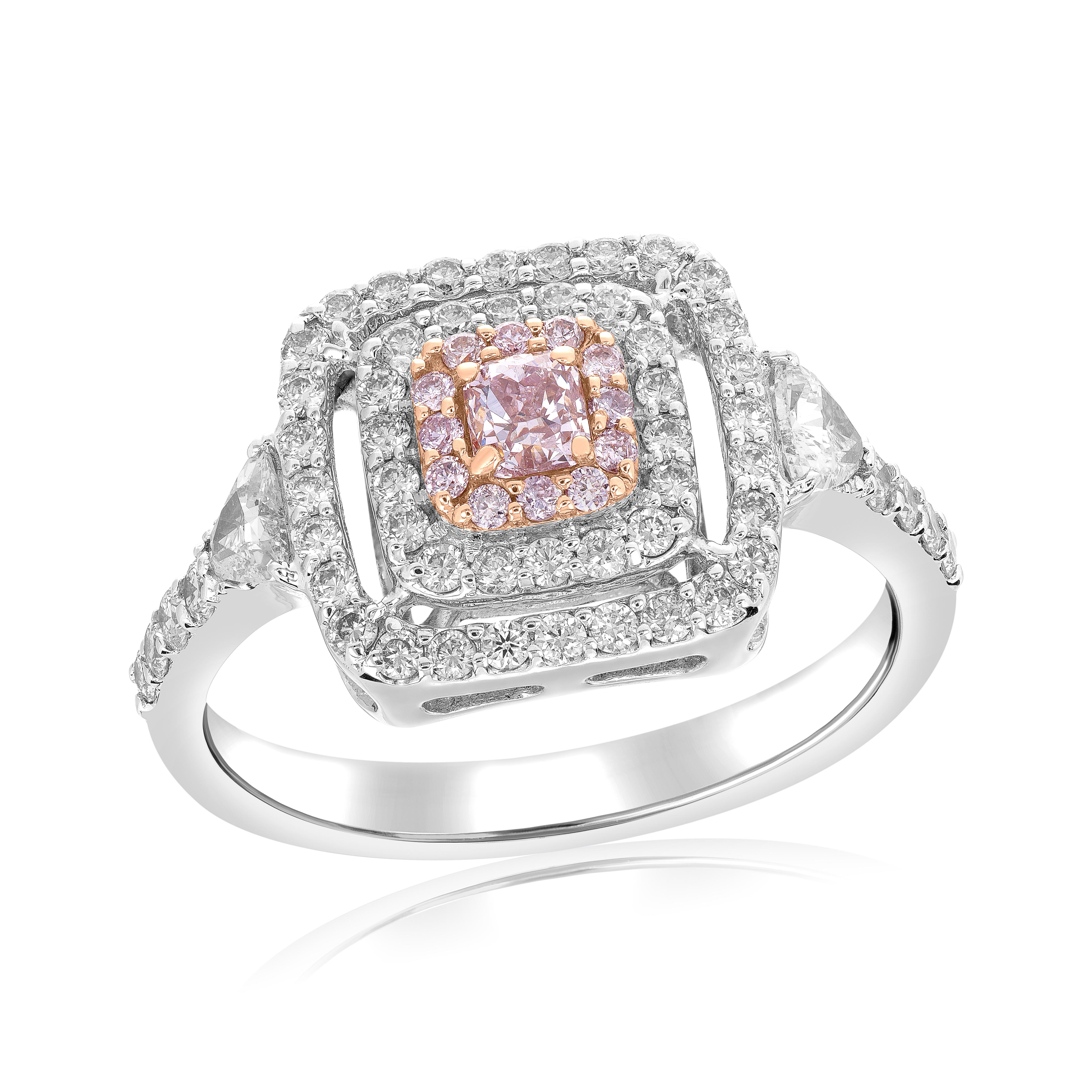 Make a statement with this exquisite pink diamond ring, showcasing a stunning 0.20-carat fancy brownish-pink cushion diamond. The captivating pink hue of the center diamond is beautifully accentuated by 12 pink melee diamonds, totaling 0.07 carats,