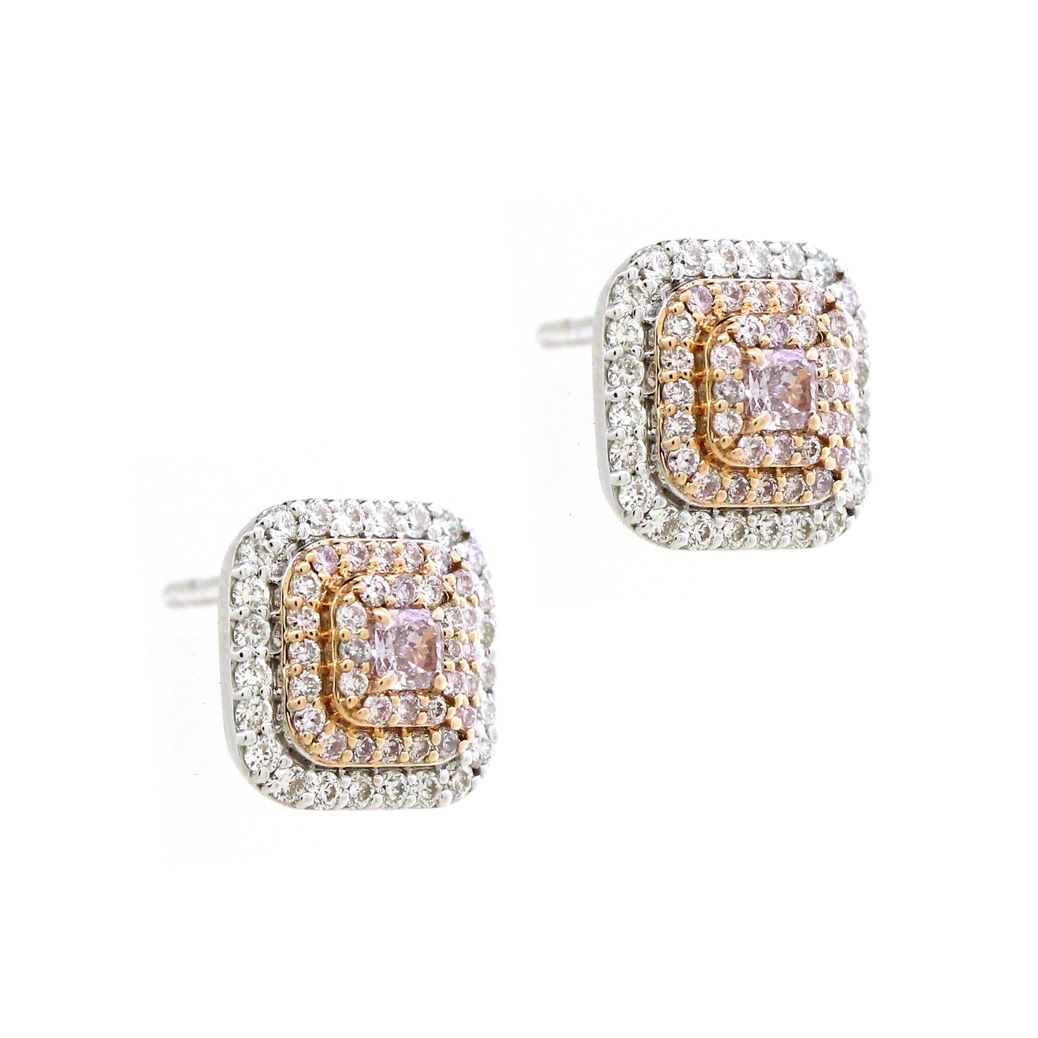 Each earring boasts a central cushion-shaped pink diamond, with a combined weight of 0.2 carats. 
Surrounding each cushion pink diamond is a dazzling halo of 64 round pink diamonds, totaling 0.31 carats. 
The outer halo comprises 48 round white