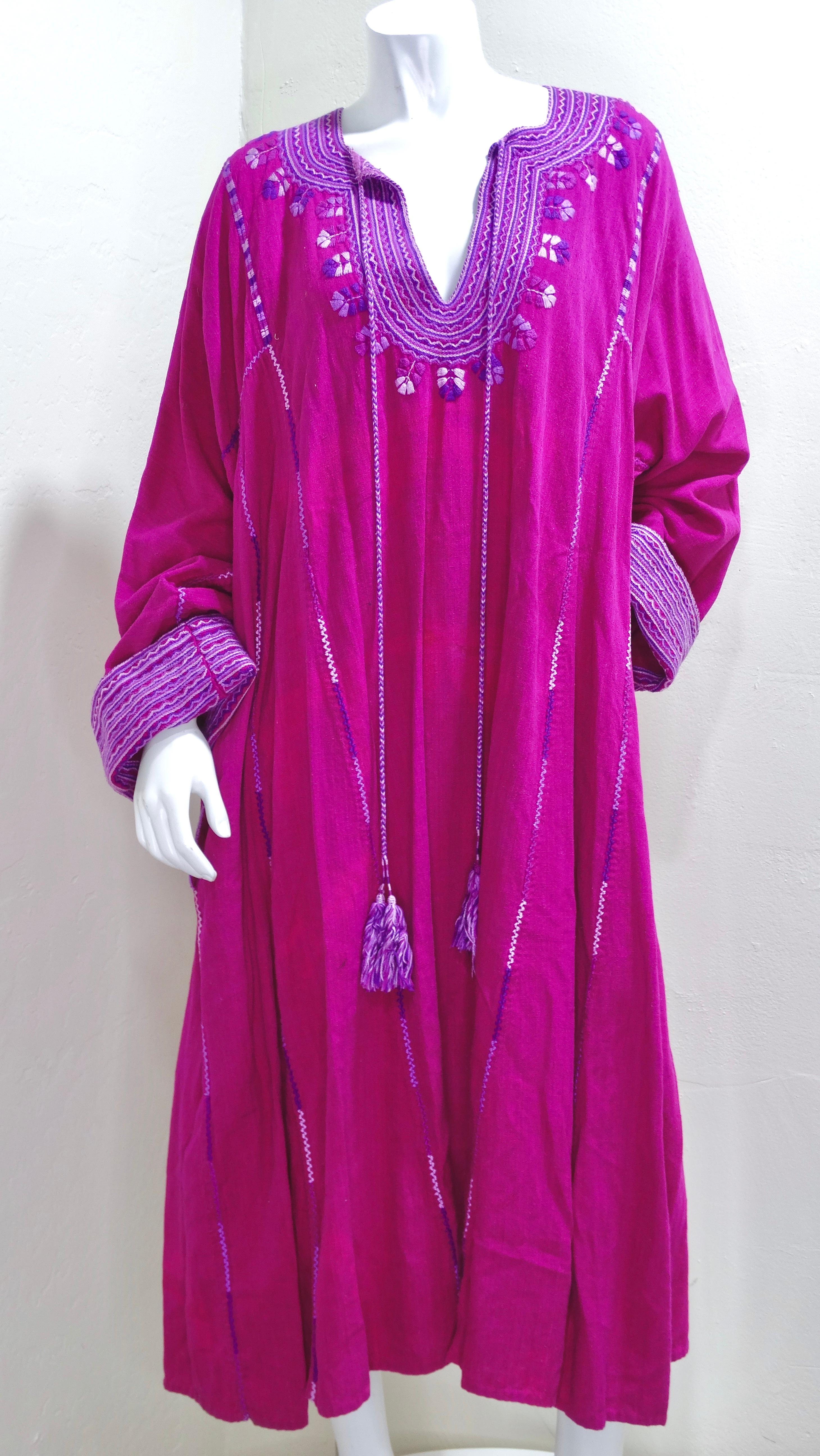 You can't go wrong with this vibrant kaftan. It would be a perfect addition to your closet as the pink and violet will instantly lift your mood. Do not miss details like the fully embroidered sleeve-cuffs and neckline, embroidered flower details,