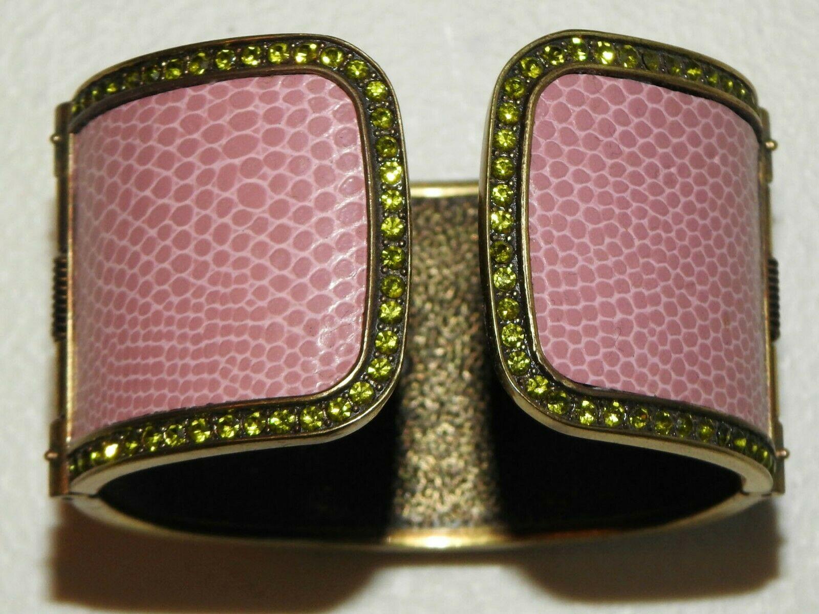 Simply Beautiful Double Hinged Pink Enamel Cuff Bracelet, outlined in Crystals and center embellished with multi-colored Swarovski Crystals in an ornate design; over embossed Leather. Measuring approx. 1.63” wide x 6.5” inside Circumference x  0.50”