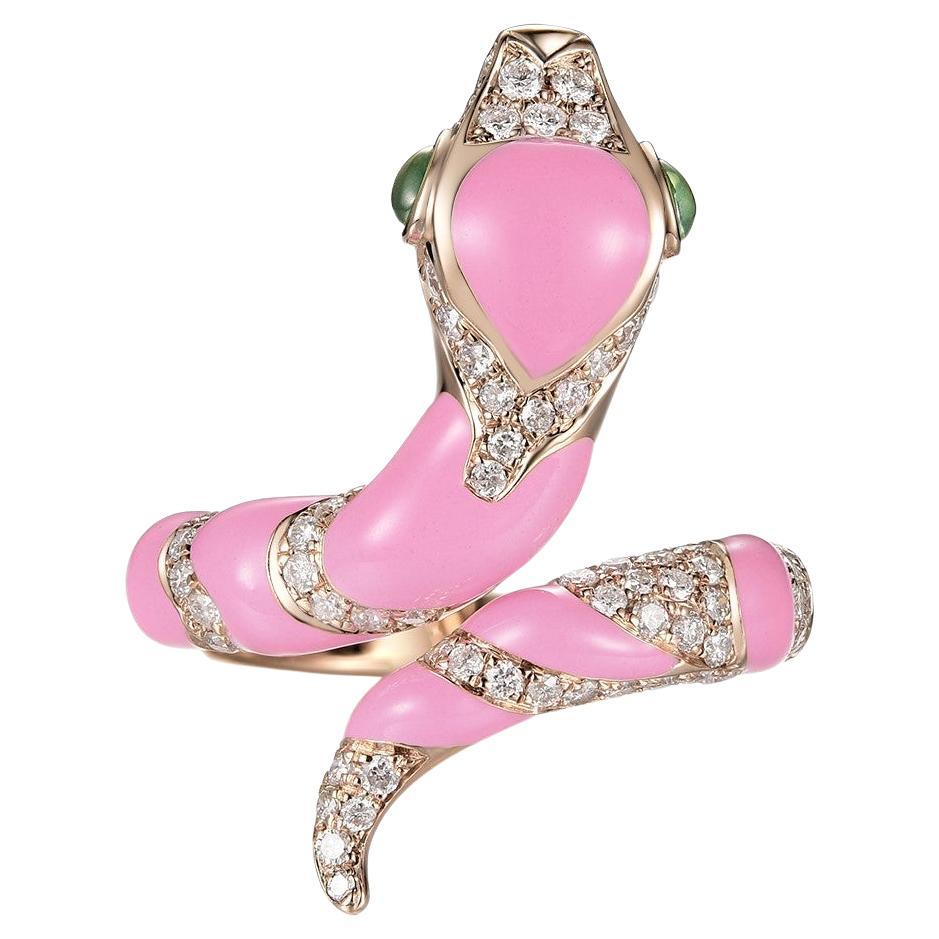 This stunning snake ring features 0.58 carat of white round diamonds, the body is covered with pink enamel. The eyes of the ring is set with jade (eye). The snake can be customized in any color or stones. Feel free to contact me for inquiry. More
