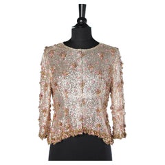 Pink evening jacket beaded with rhinestone and sequin on a tulle base Circa 1960