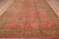 Pink Field Antique Oushak, circa 1920s