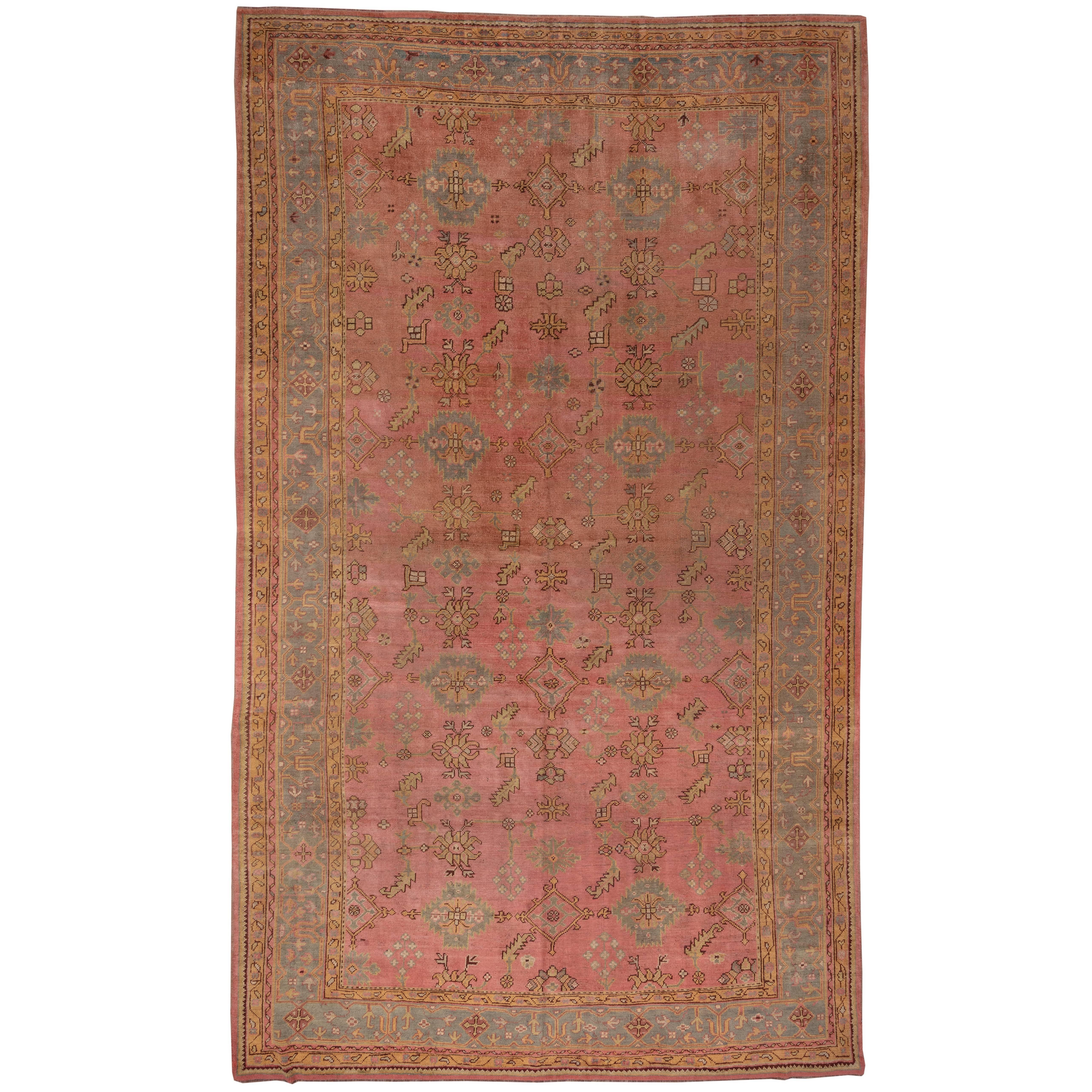 Pink Field Antique Oushak, circa 1920s