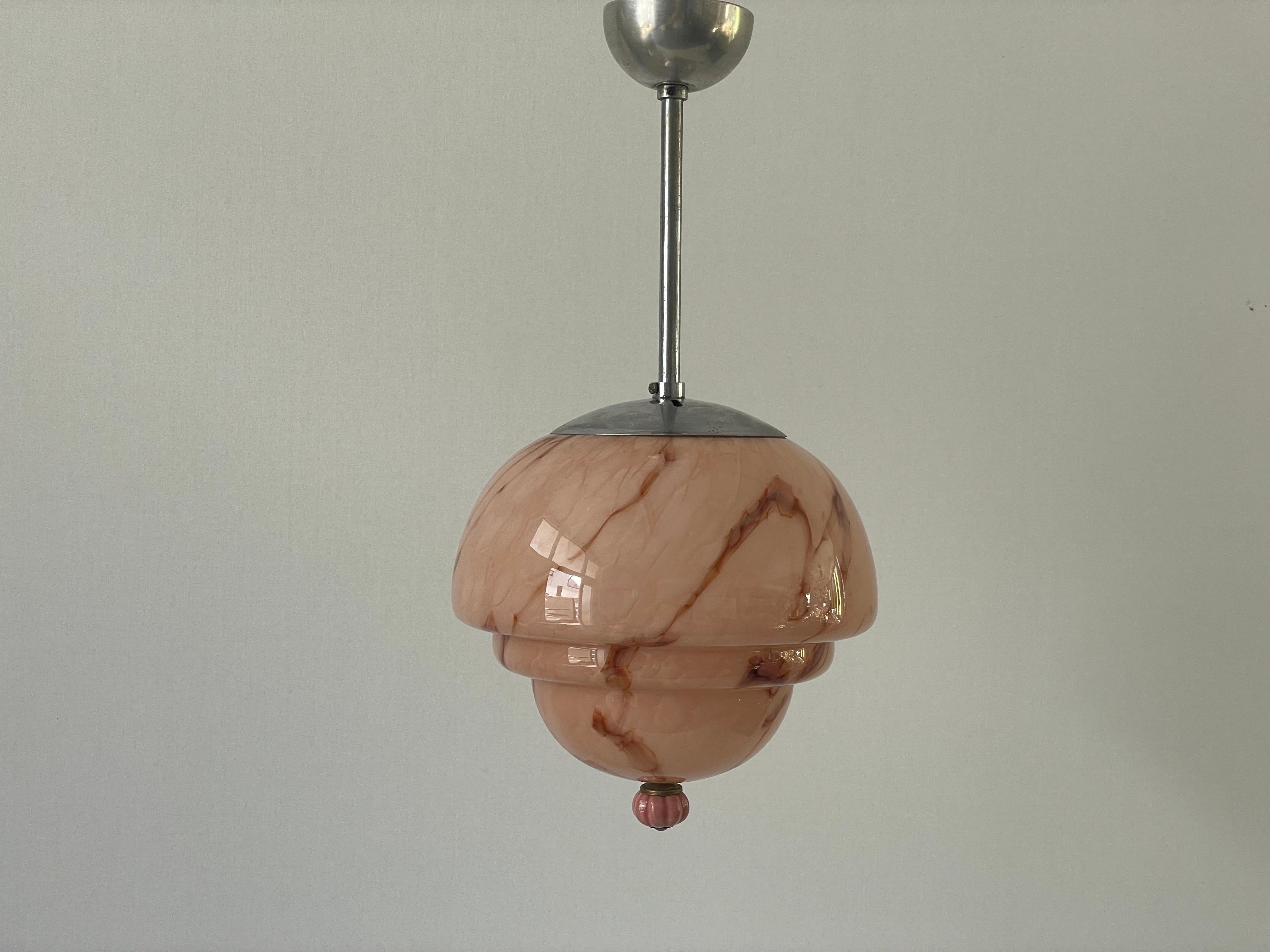Pink Glass Art Deco Style Ceiling Lamp, 1940s, Germany

Lampshade is in very good vintage condition.

This lamp works with E27 light bulbs. 
Wired and suitable to use with 220V and 110V for all countries.

Measurements: 
Height: 50 cm
Shade diameter