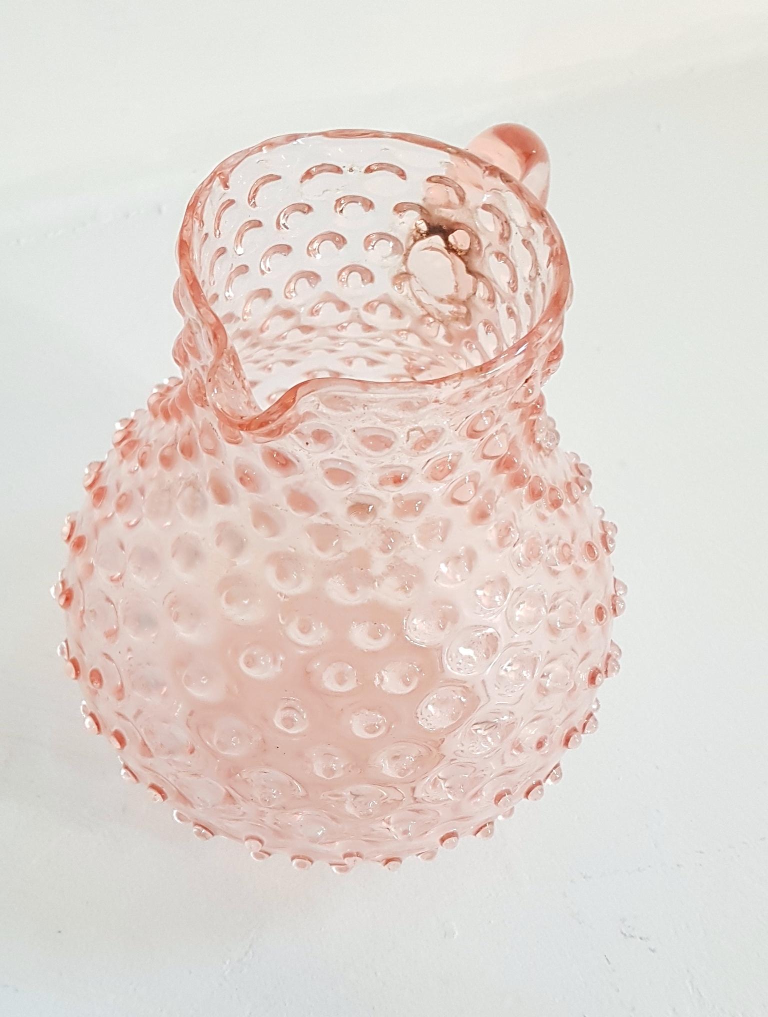 Handmade hobnail glass jug by Italian manufacturer Empoli in pink. Fills with about 2liters of liquid.